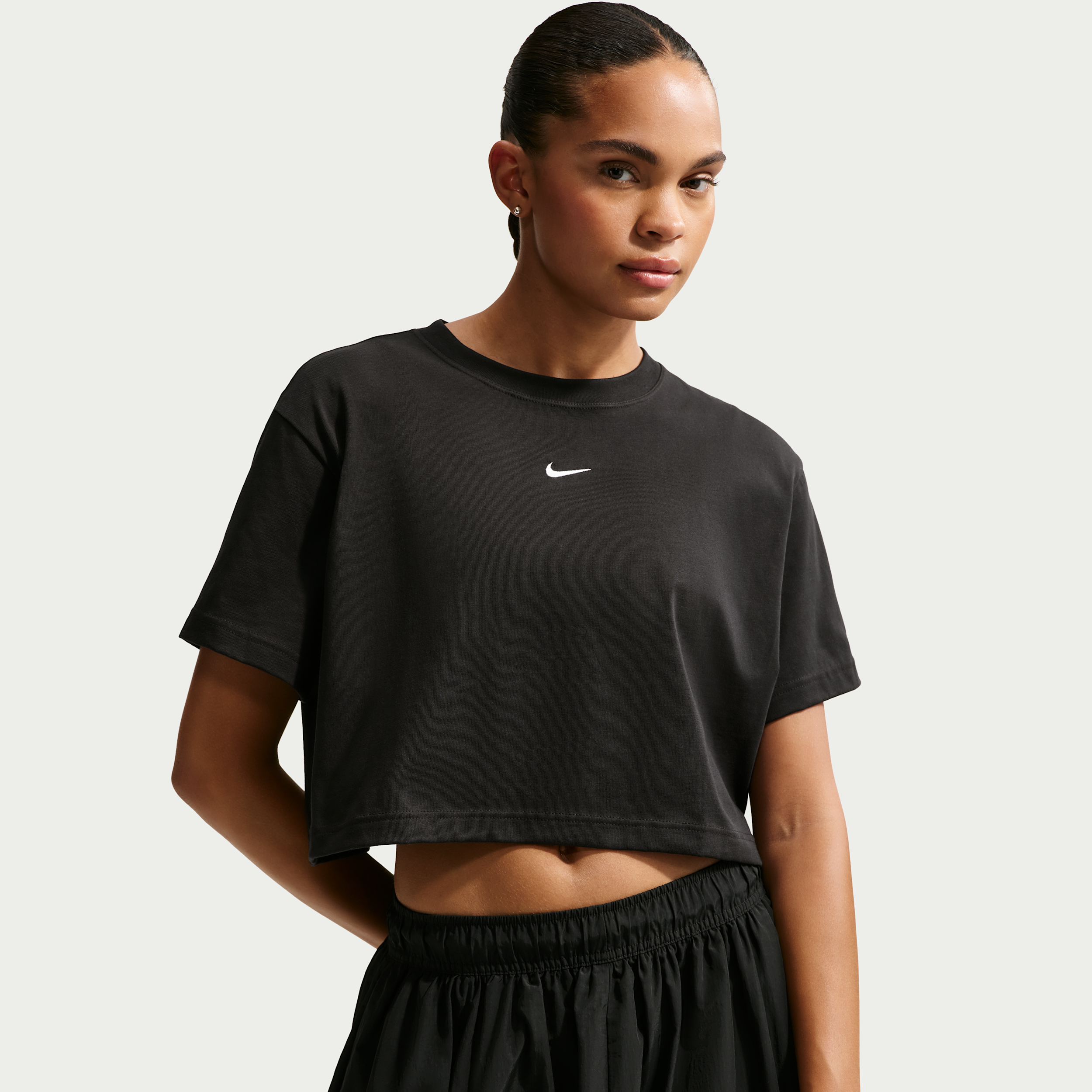 Women's Nike Sportswear Loose Short-Sleeve Cropped T-Shirt in Black | IH7594-010