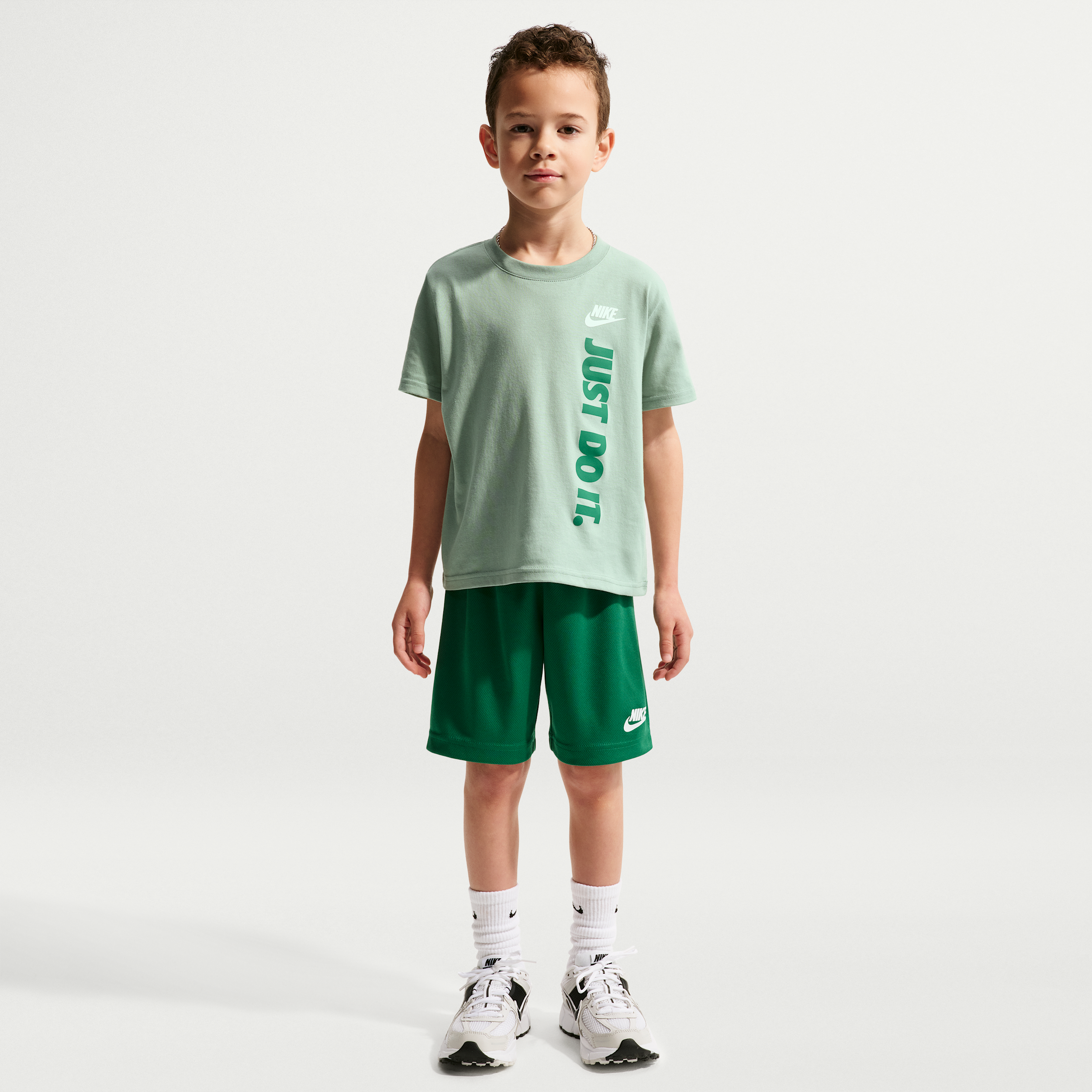 Nike Sportswear Little Kids' "Just Do It" Graphic T-Shirt and Mesh Shorts Set in Green | 86L732-EJ1