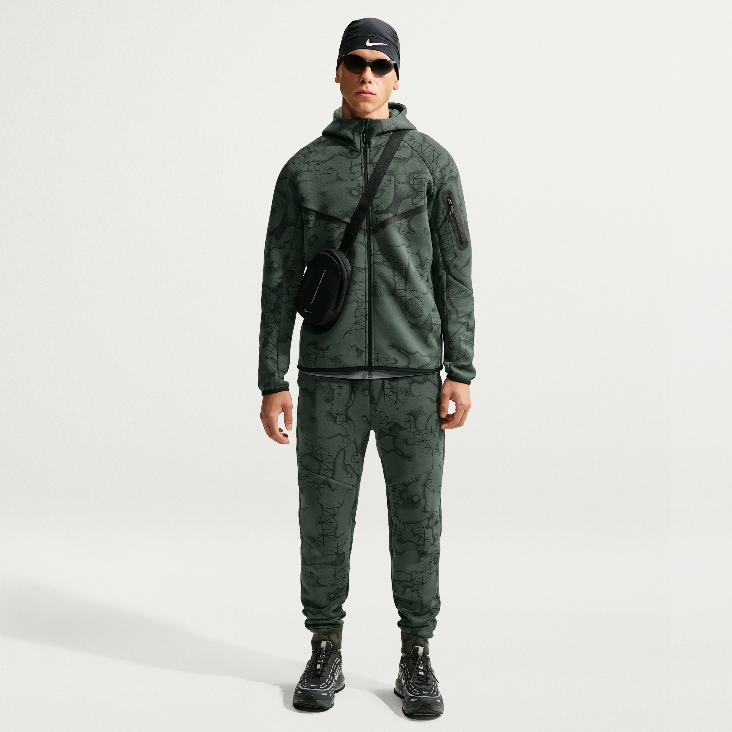 Nike Men's Tech Slim Fleece All-Over-Print Jogger Pants in Green | IM6213-303