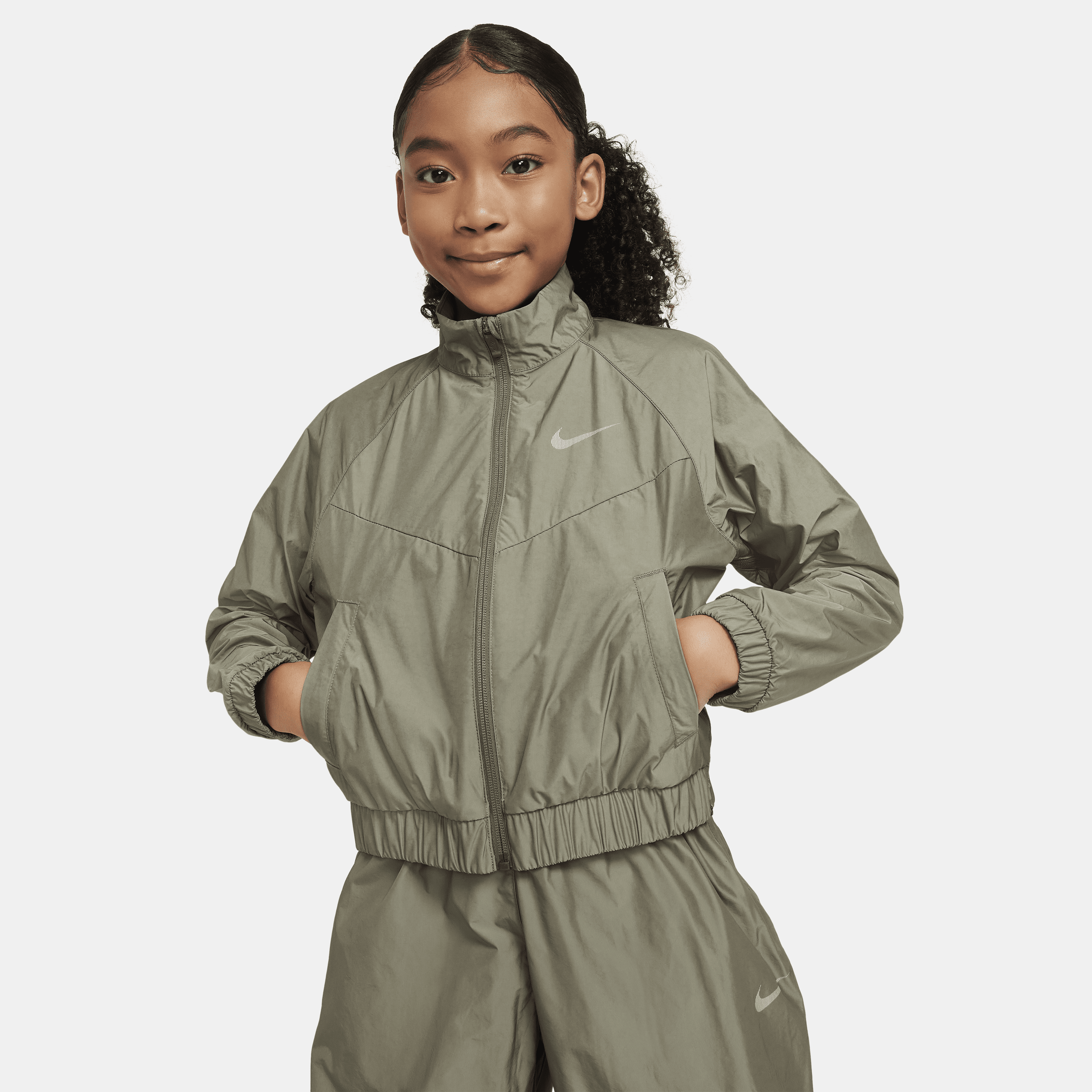 Shop Nike Sportswear Windrunner Big Kids' (girls') Loose Jacket In Green