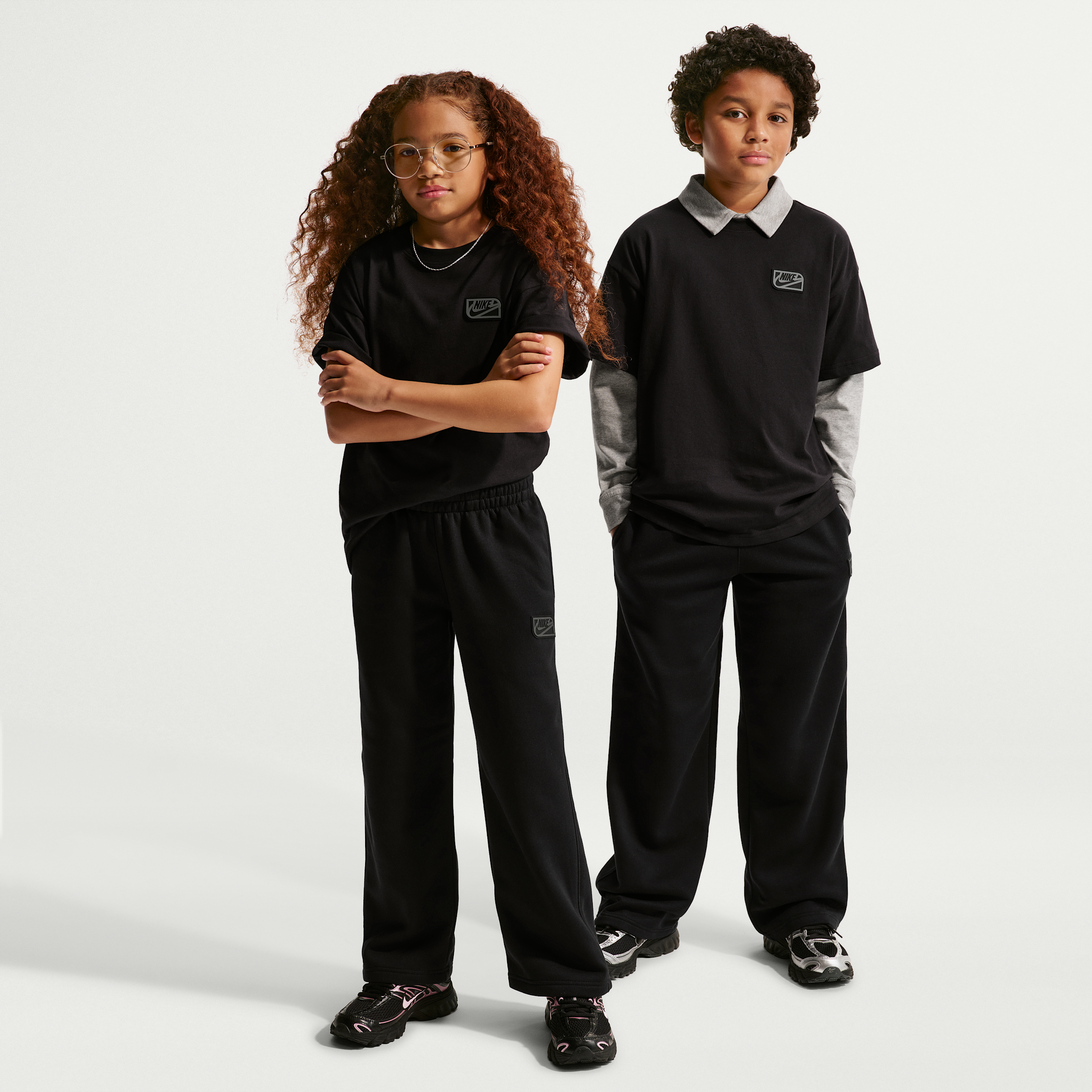 Nike Sportswear Club Fleece Big Kids' Fleece Open-Hem Pants in Black | IO1694-010