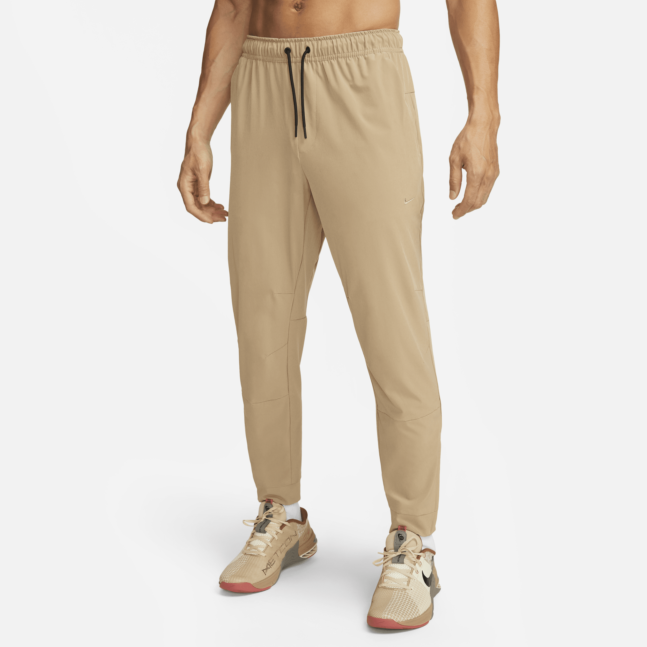 Nike Men's Unlimited Dri-fit Zippered Cuff Versatile Pants In Brown