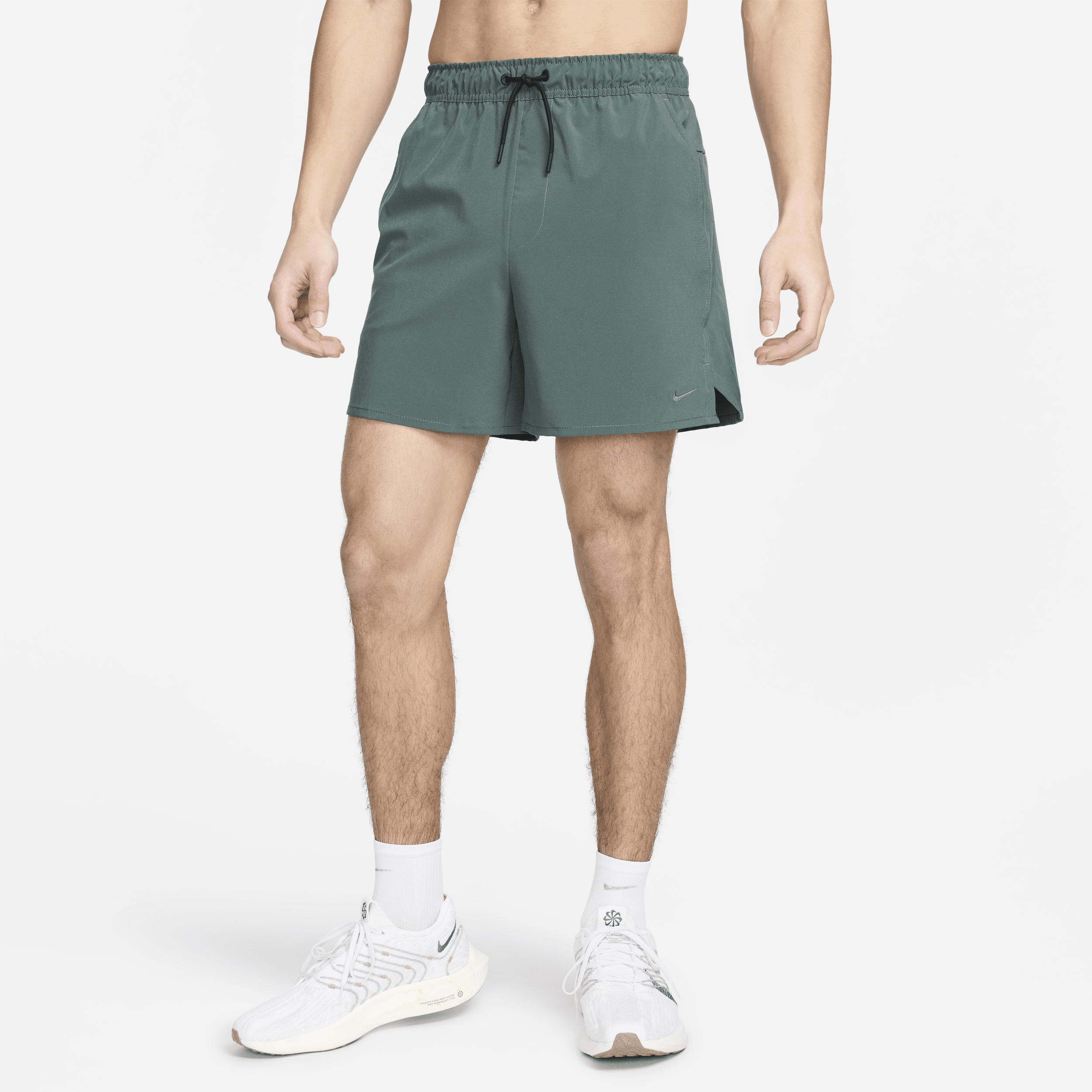 Shop Nike Men's Unlimited Dri-fit 5" Unlined Versatile Shorts In Green