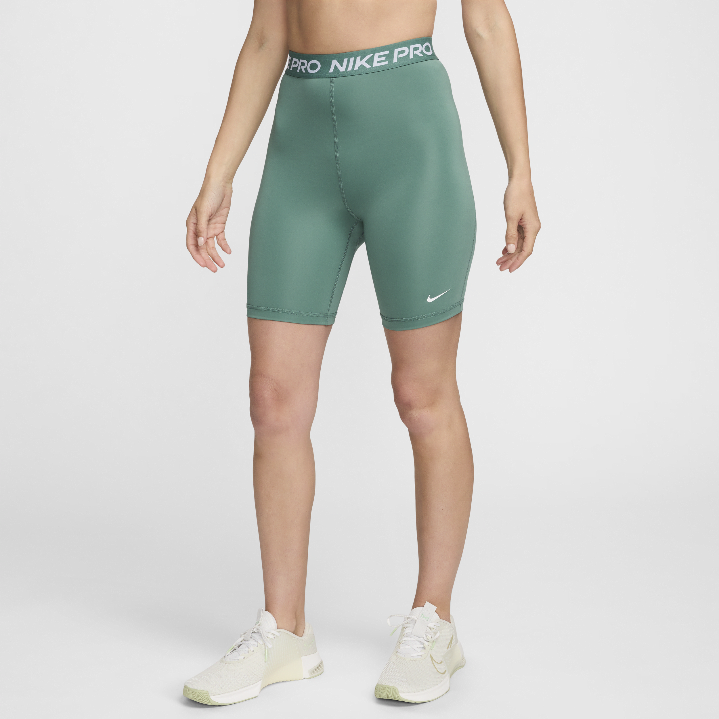 Shop Nike Women's  Pro 365 High-waisted 7" Shorts In Green