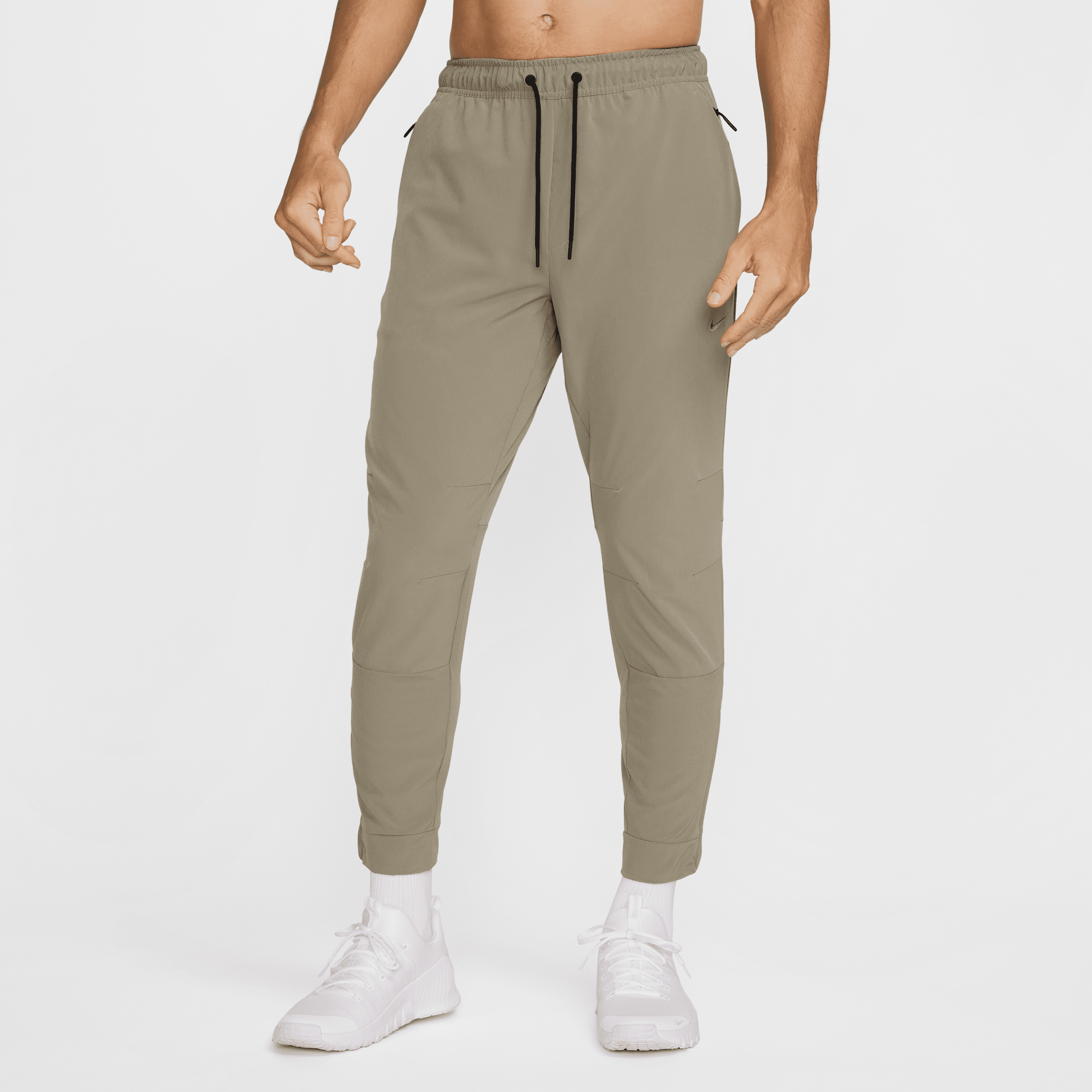 Nike Men's Unlimited Dri-fit Zippered Cuff Versatile Pants In Green