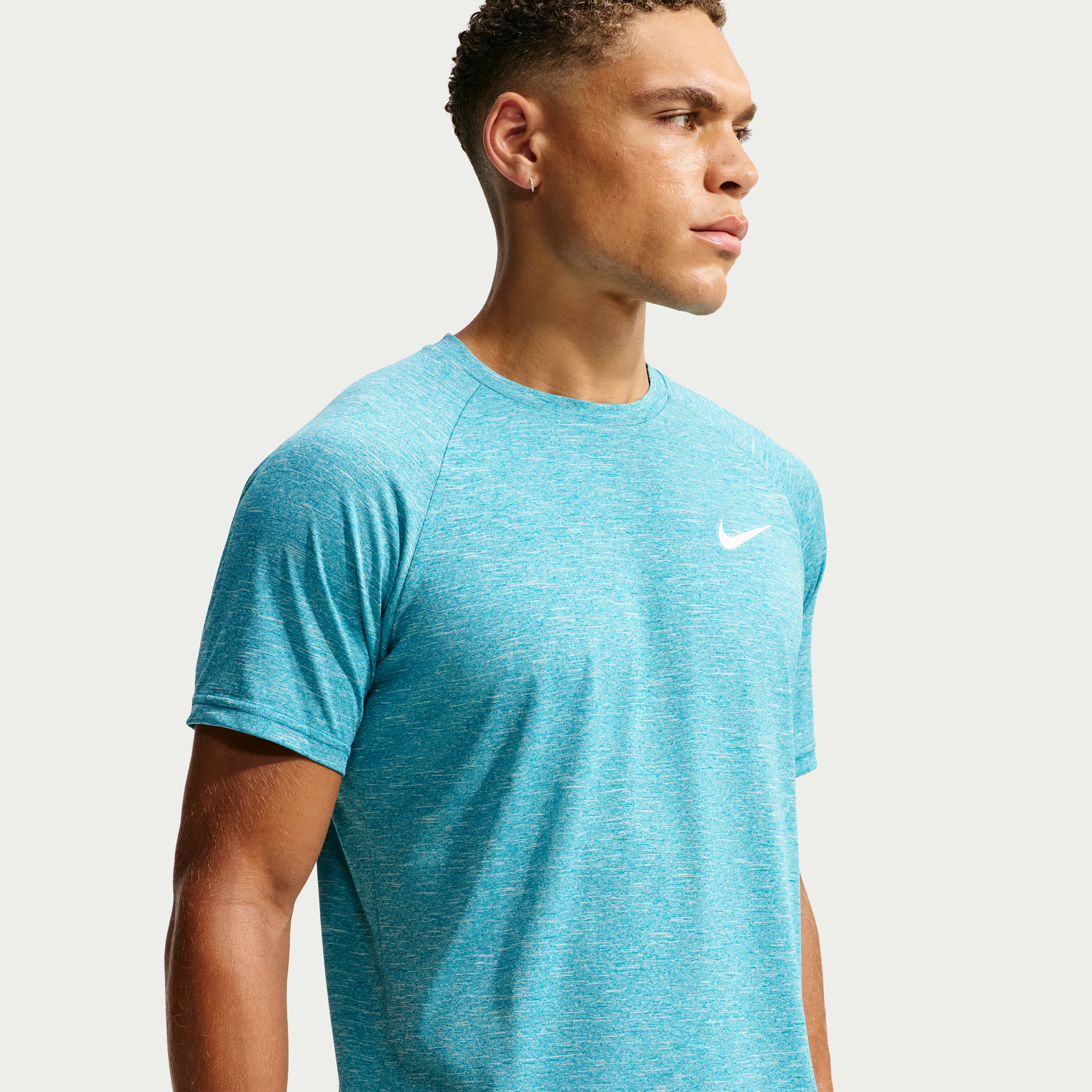 Nike Men's Swim Hydroguard Essential Dri-FIT UV Short Sleeve Top in Green | NESSA589-385