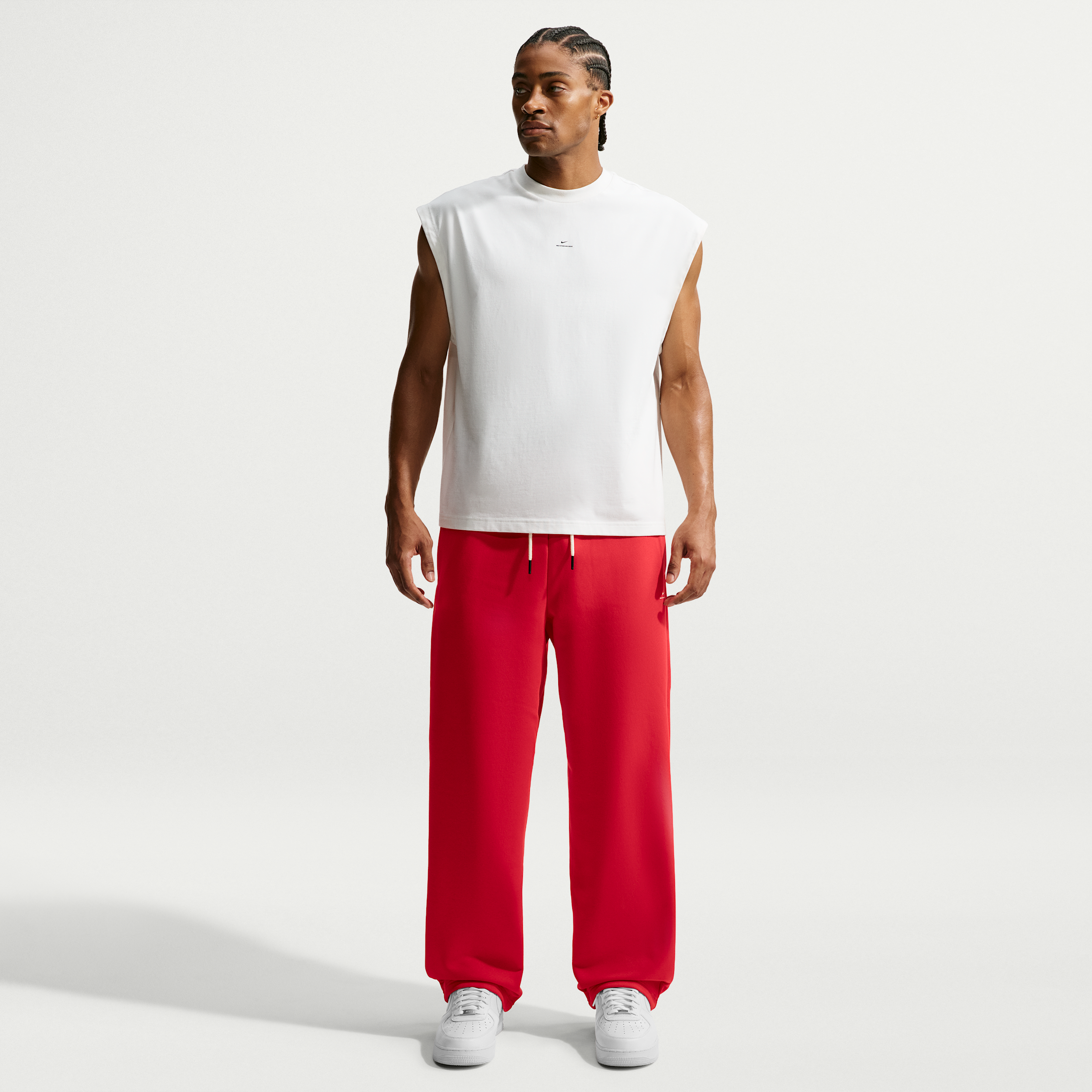 Nike Men's Standard Issue Therma-FIT Brushed Open-Hem Basketball Pants in Red | IM6333-657