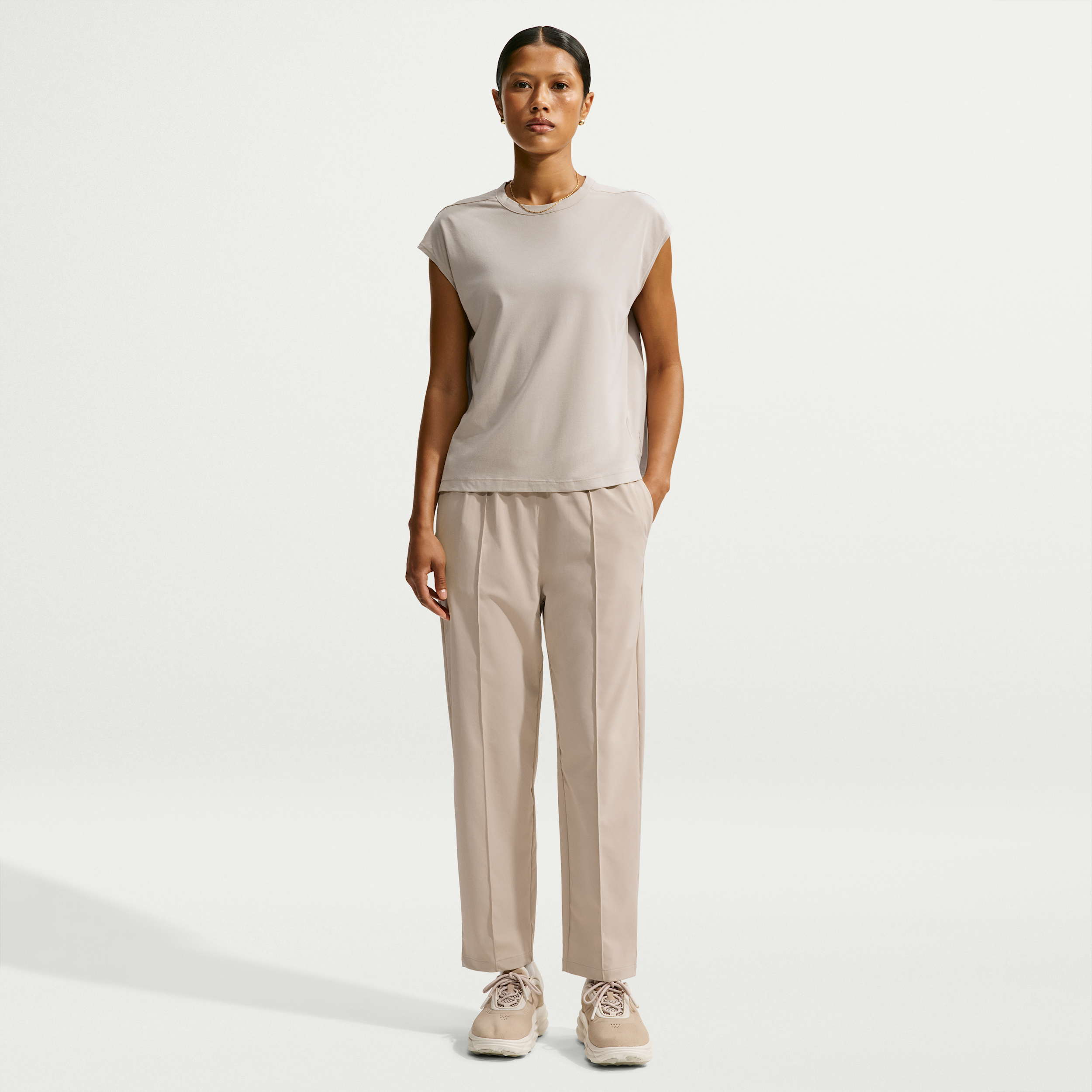 Nike Women's 24.7 PerfectStretch Dri-FIT UV Protection High-Rise Tapered Pants in Brown | HM8844-236