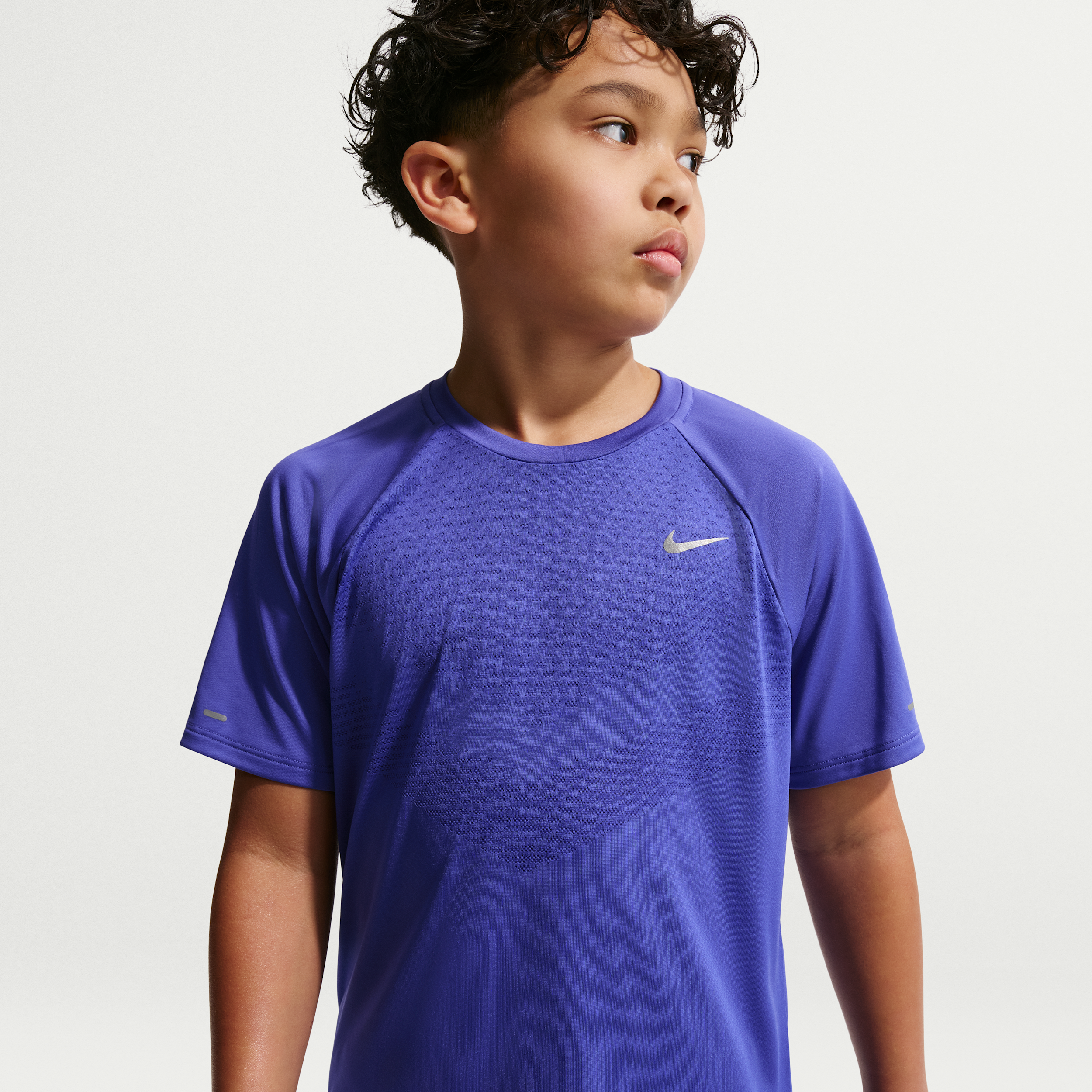 Nike Stride Big Kids' Dri-FIT Short-Sleeve Top in Blue | IO0522-430