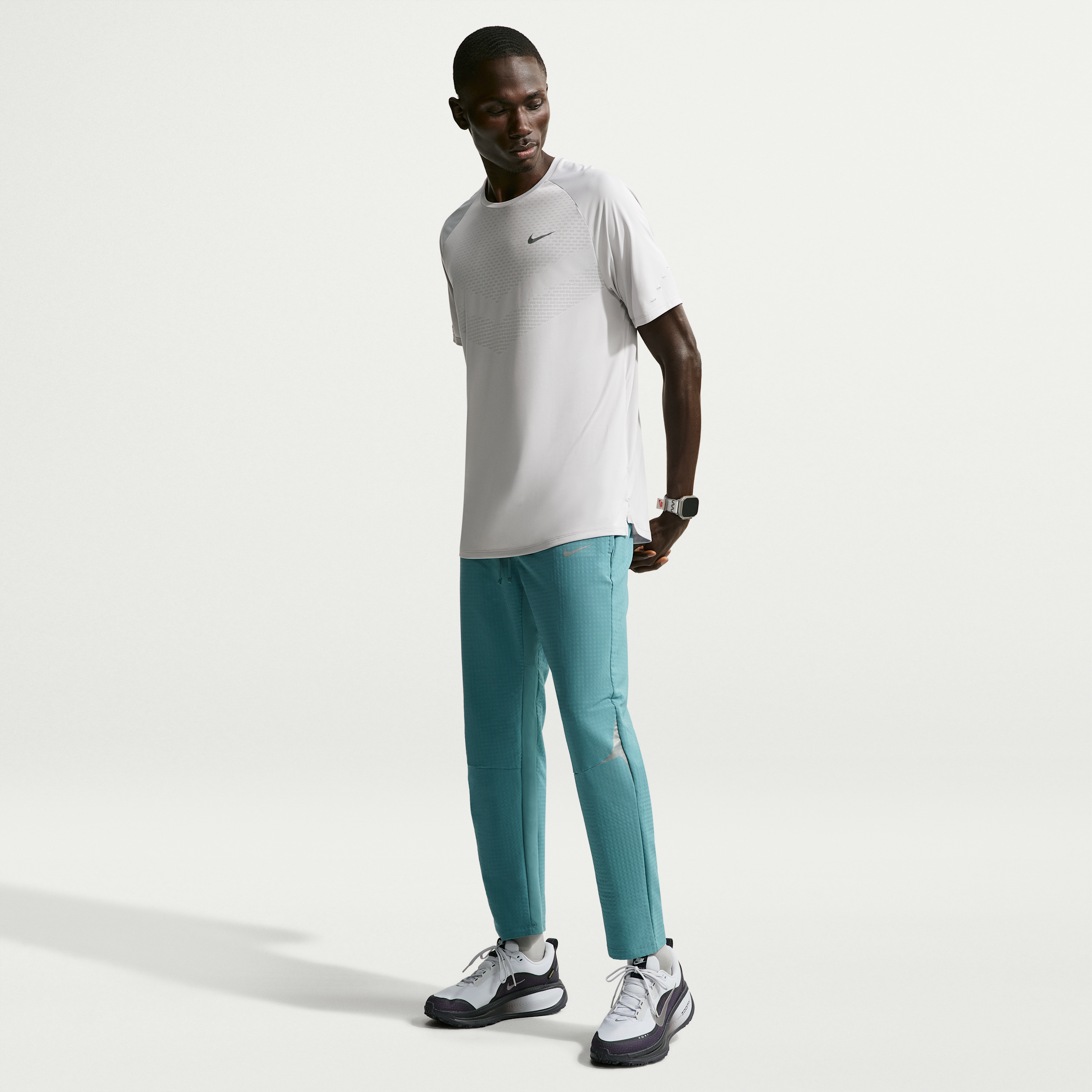 Nike Men's Stride Therma-FIT Winterized Running Pants in Blue | IO1246-008