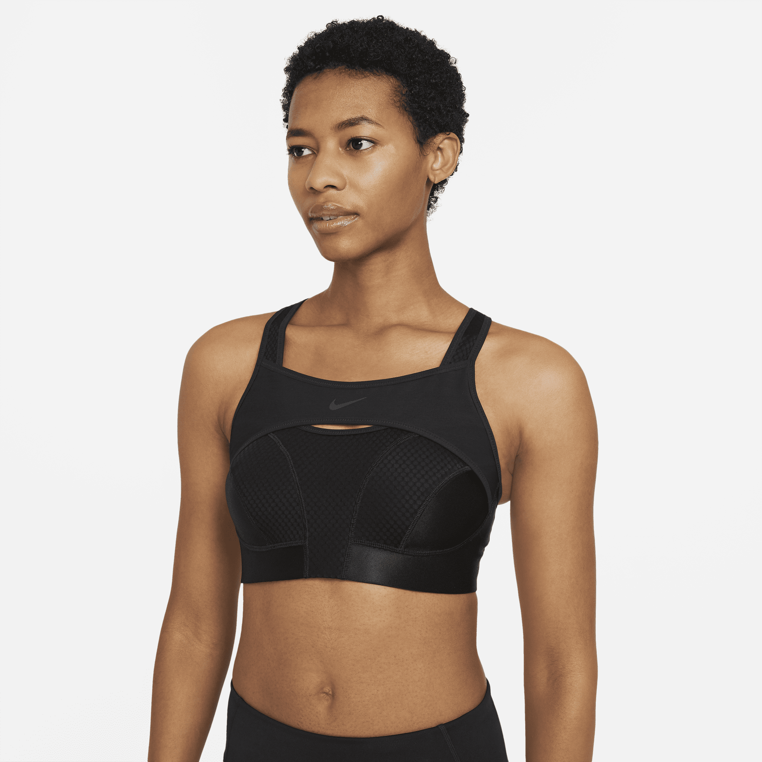 Take sweat out of the equation with the Nike Alpha UltraBreathe Sports Bra. Our highest level of support comes in an ultralight and breezy design that dries fast to keep you comfortable and focused. The overlay across the chest minimises bounce, prevents spillage and adds an extra layer of support so you can feel confident while you move. Ultralight Breathability::Nike Dri-FIT ADV technology combines moisture-wicking fabric with advanced engineering and features to help you stay dry and comfortable.,Movement Ready::The high-support design gives you added coverage at the neckline without feeling restrictive for high-intensity workouts.,Adjustable Comfort::Adjustable straps let you fine-tune your most comfortable fit. A double closure on the back allows for easy on and off. Product Details::Tight fit for a body-hugging feelMoulded cupsBody: 81% nylon/19% elastane. Panels: 100% polyester. Upper Front and Back Panel/Panel lining: 78% polyester/22% elastane. Binding: 76% nylon/24% elastane.Machine washImported