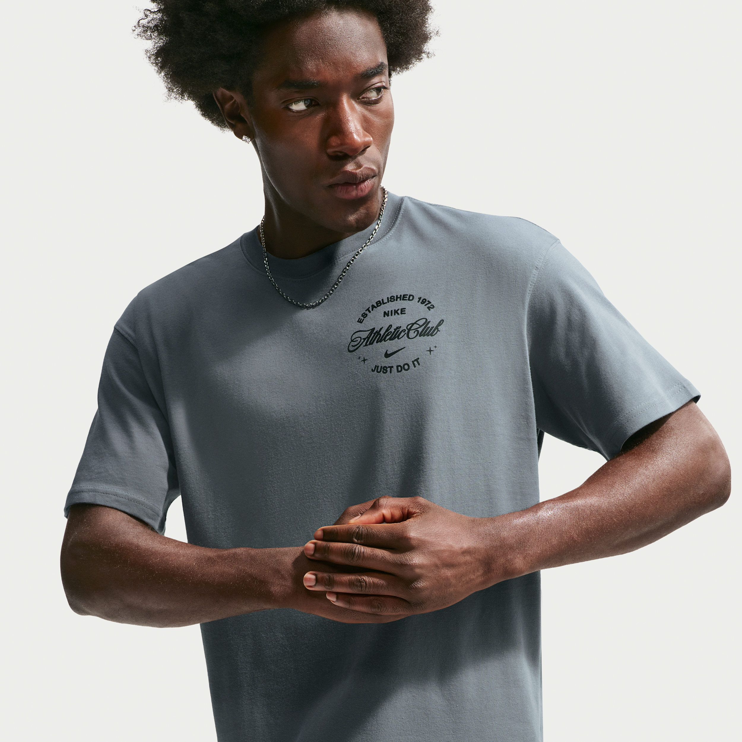 Nike Men's N. A.C. Grit Graphic T-Shirt in Smoke Grey/Black Size: Medium