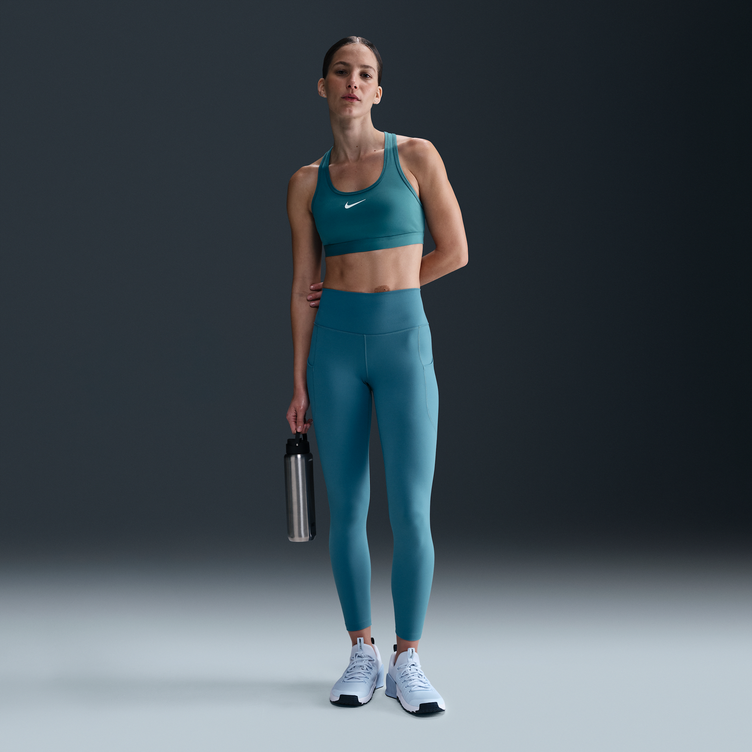 Shop Nike Women's One High-waisted 7/8 Leggings With Pockets In Blue