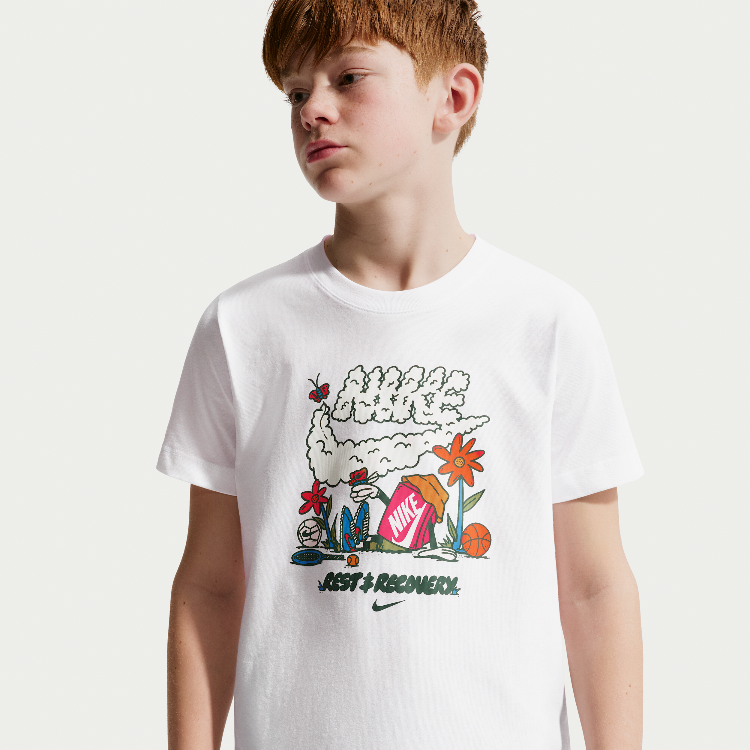 Nike Sportswear Big Kids' T-Shirt in White | II9940-100