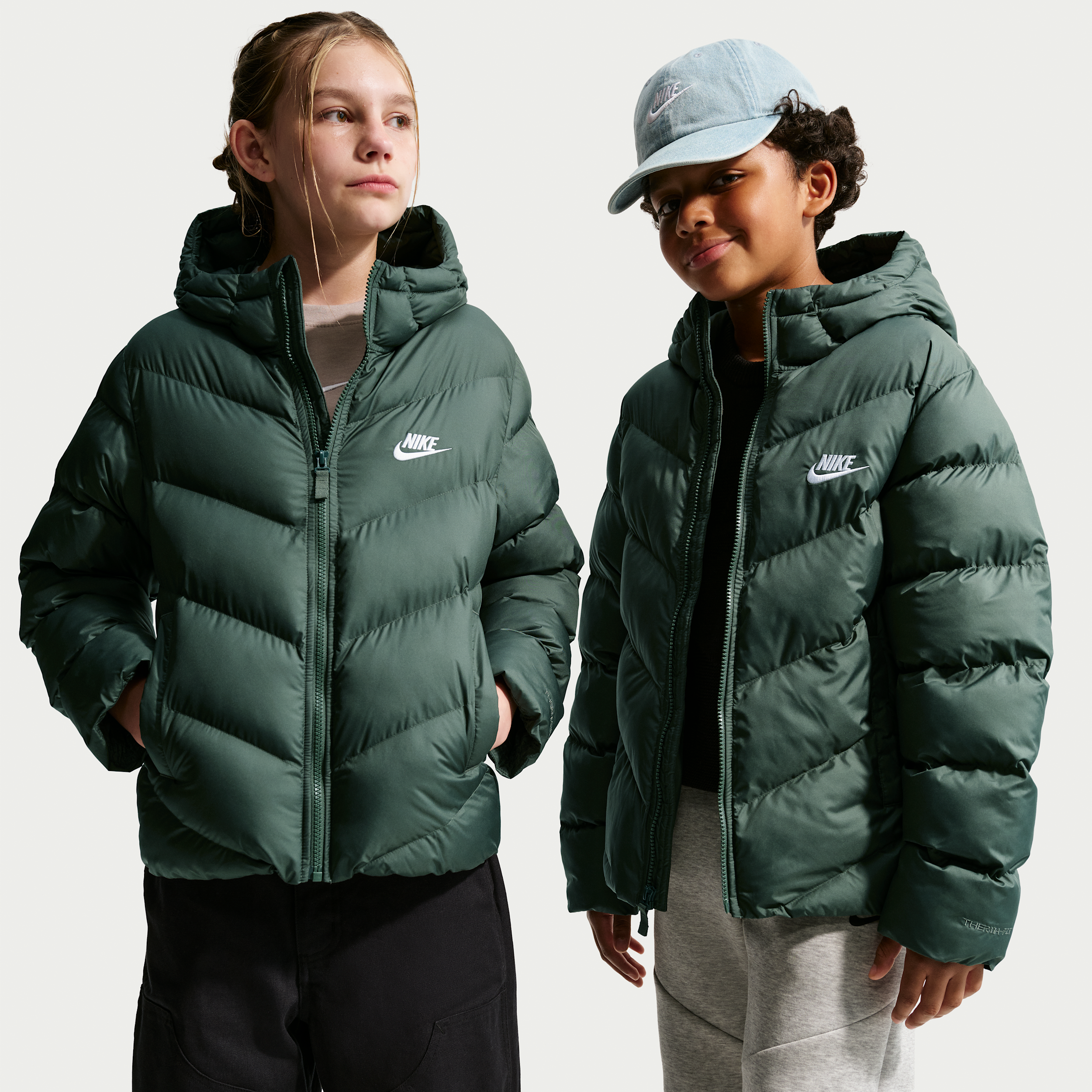 Nike Sportswear All Day Play Big Kids' Therma-FIT Loose-Fit Puffer Jacket in Green | HQ4976-303
