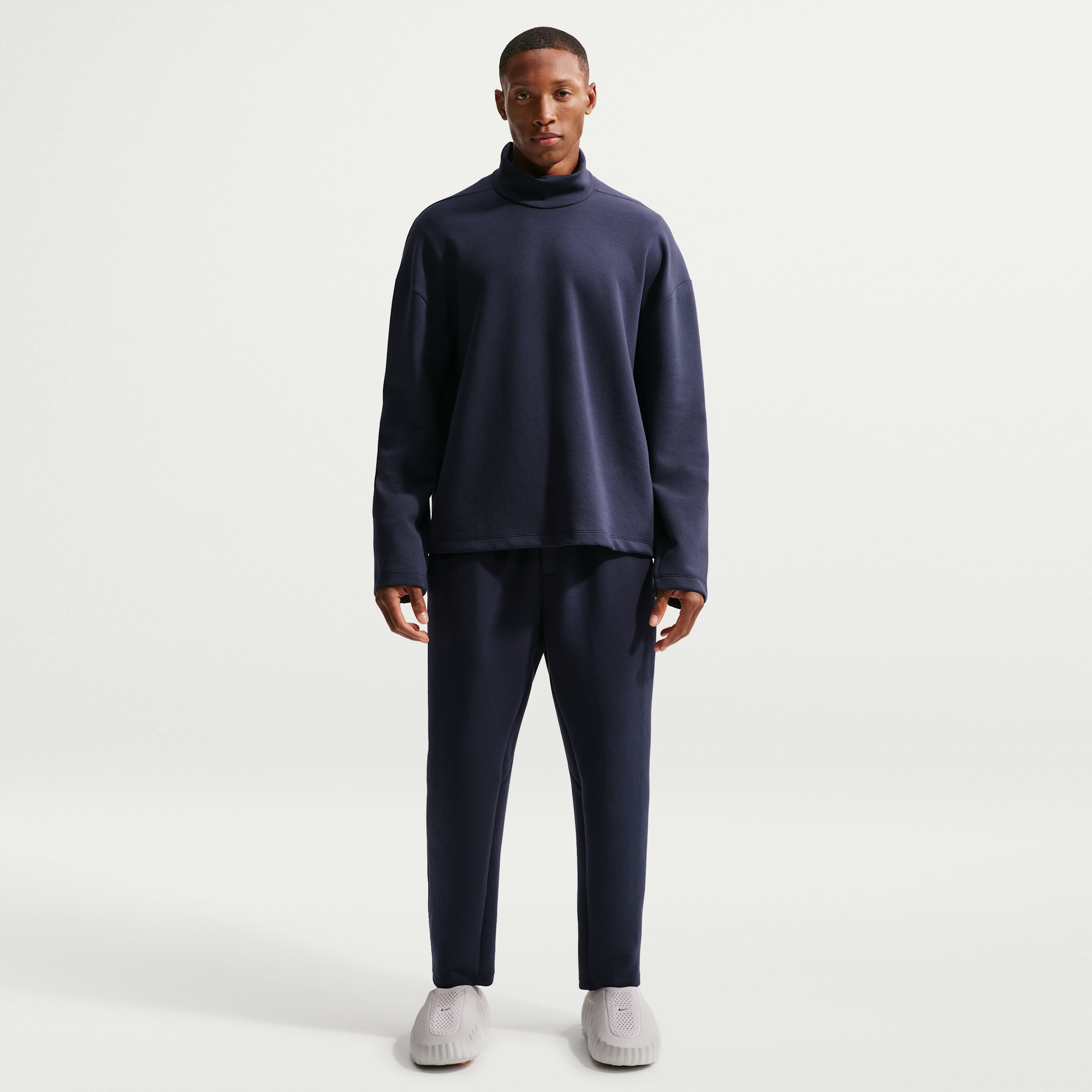 Nike Men's 24.7 ImpossiblySoft Dri-FIT Pants in Blue | HQ6970-451