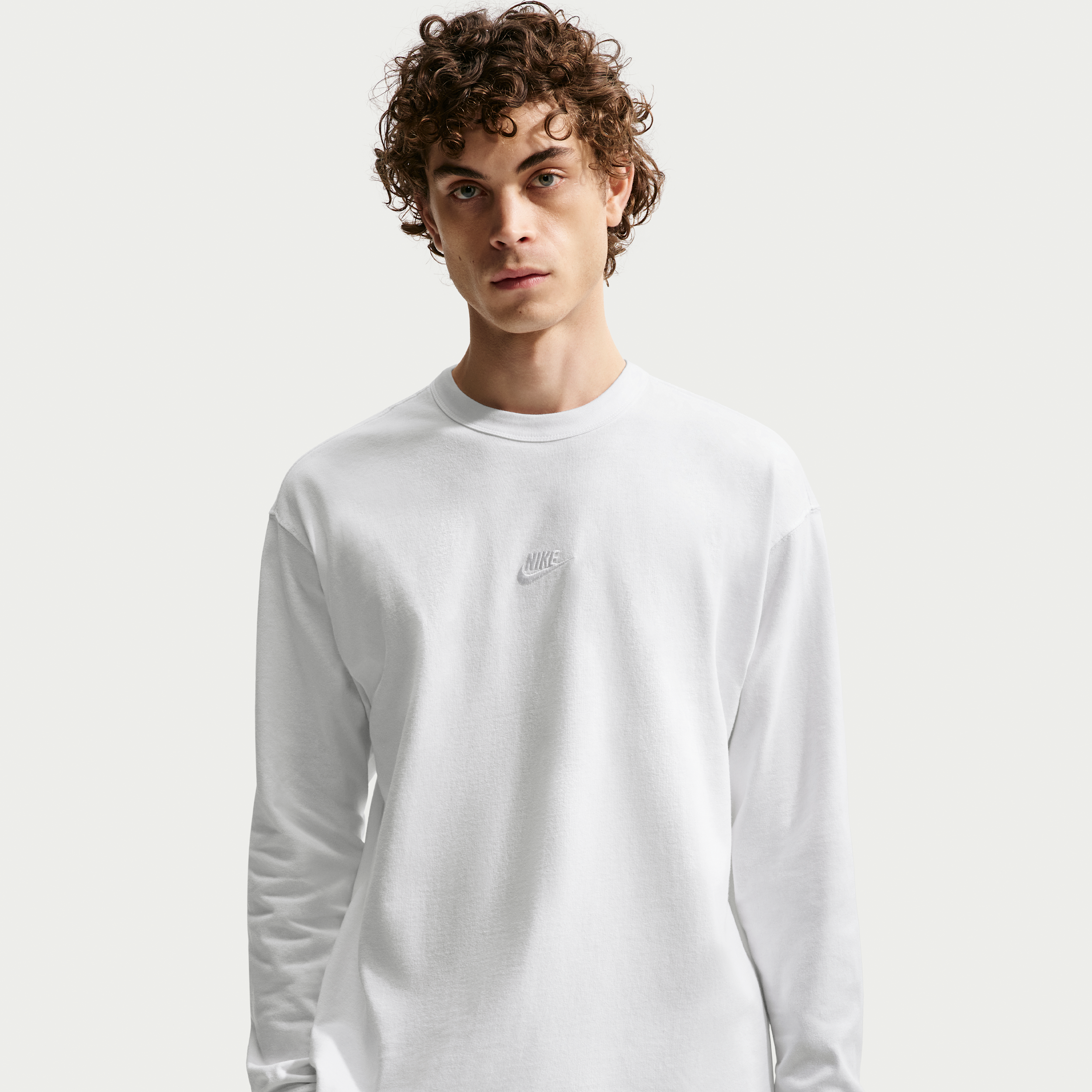 Men's Nike Sportswear Premium Essentials Long-Sleeve T-Shirt in White | IH1127-100