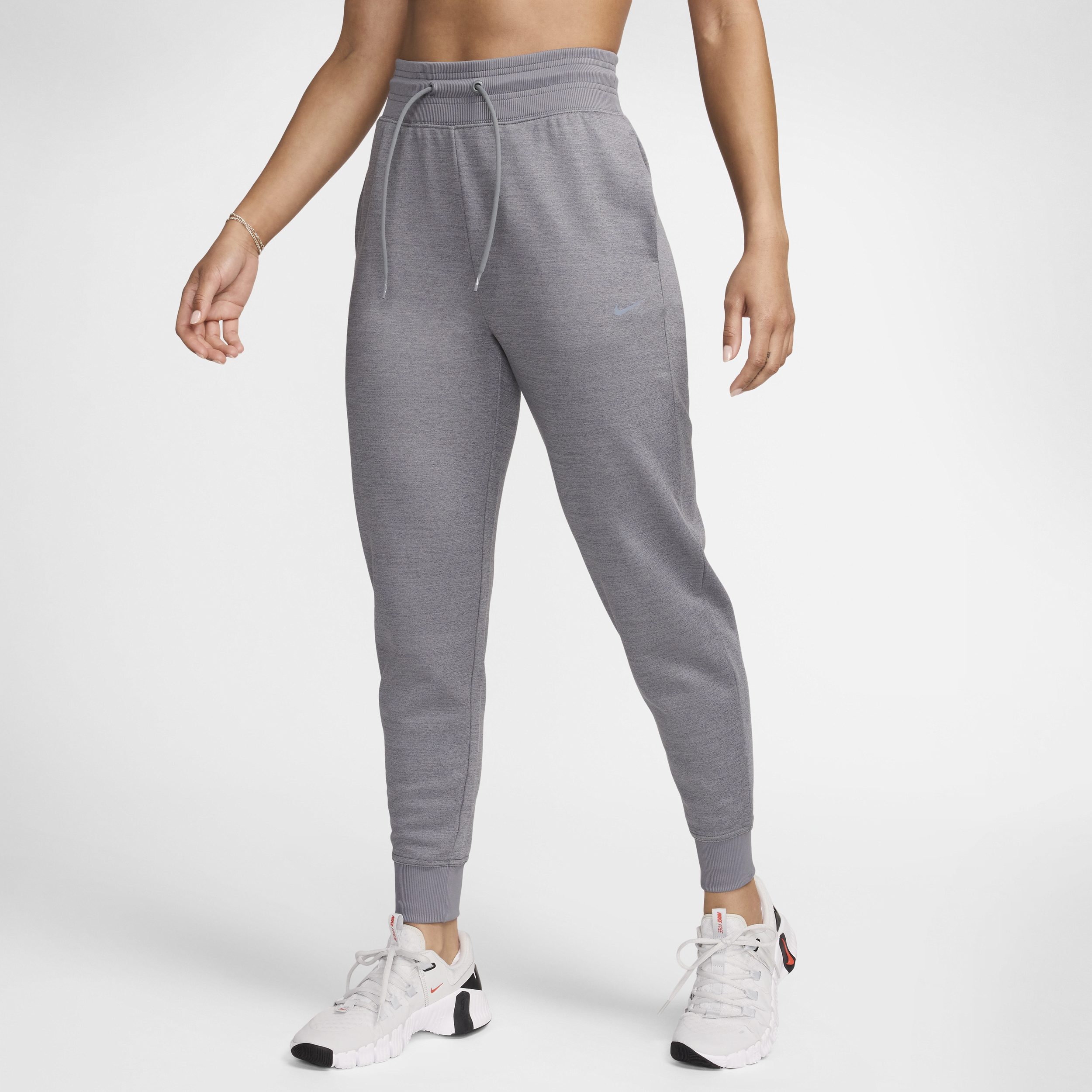 Shop Nike Women's Therma-fit One High-waisted 7/8 Jogger Pants In Grey