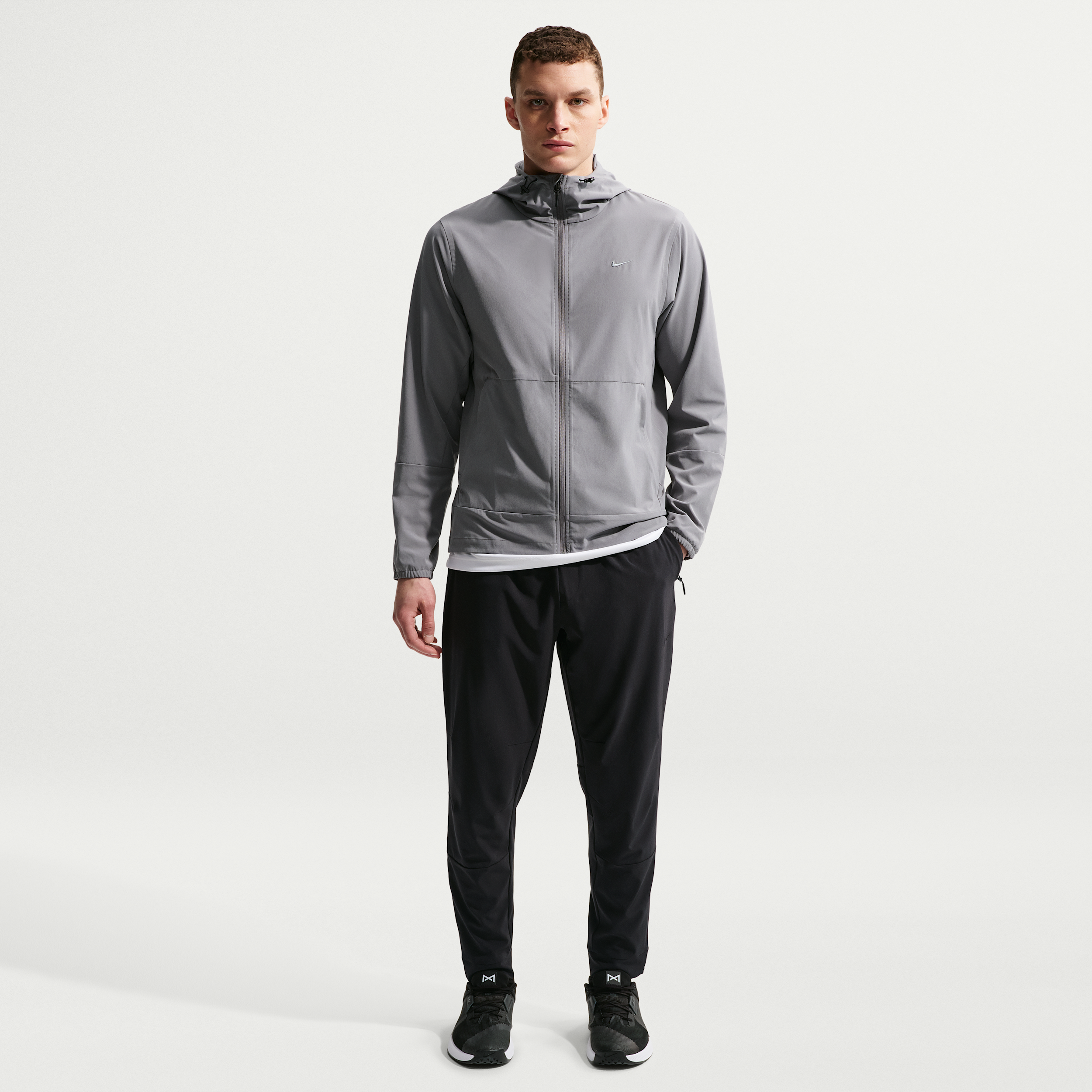 Nike Men's Unlimited Dri-FIT Zippered Cuff Versatile Pants in Black | FB7548-010
