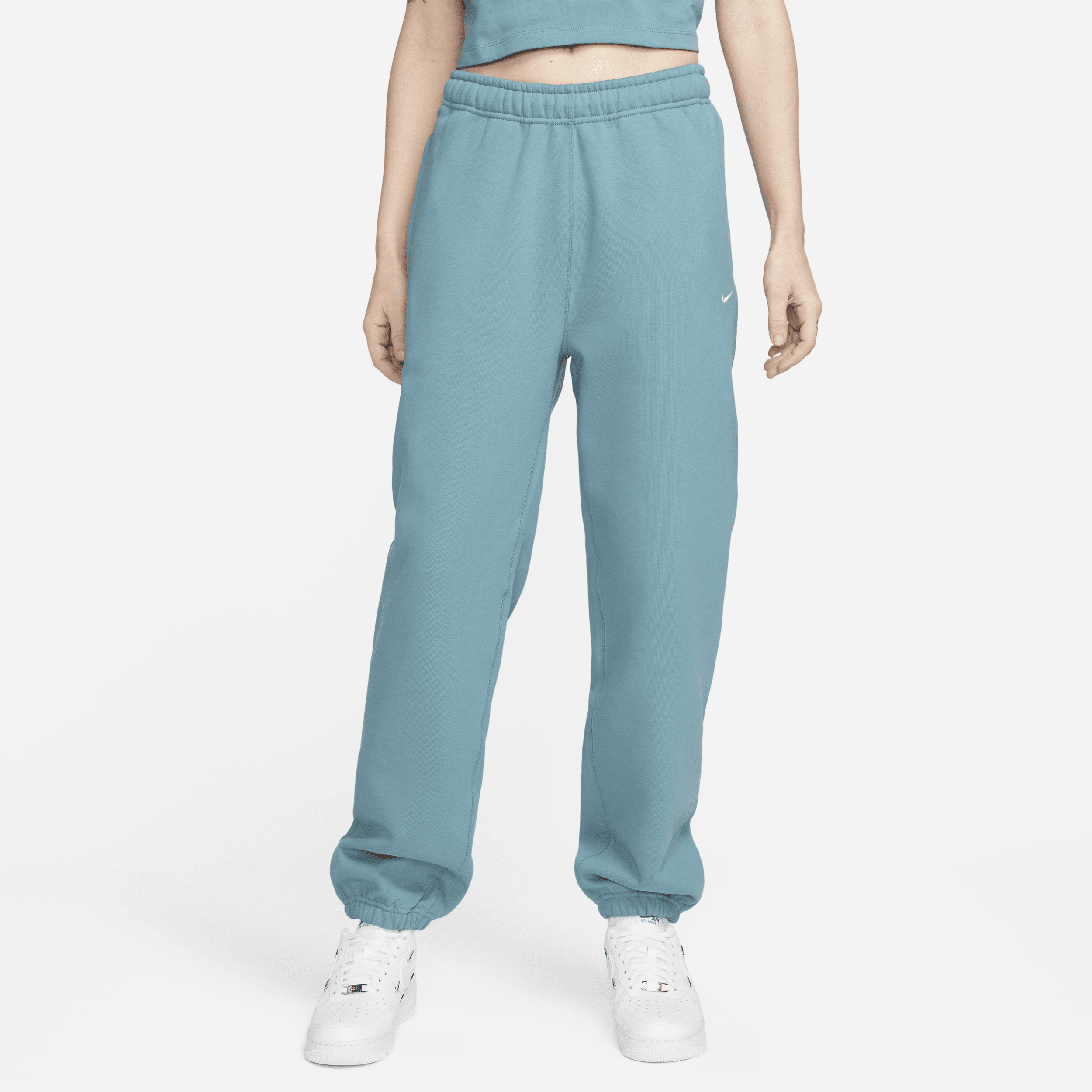 Nike Women's Solo Swoosh Fleece Pants In Blue