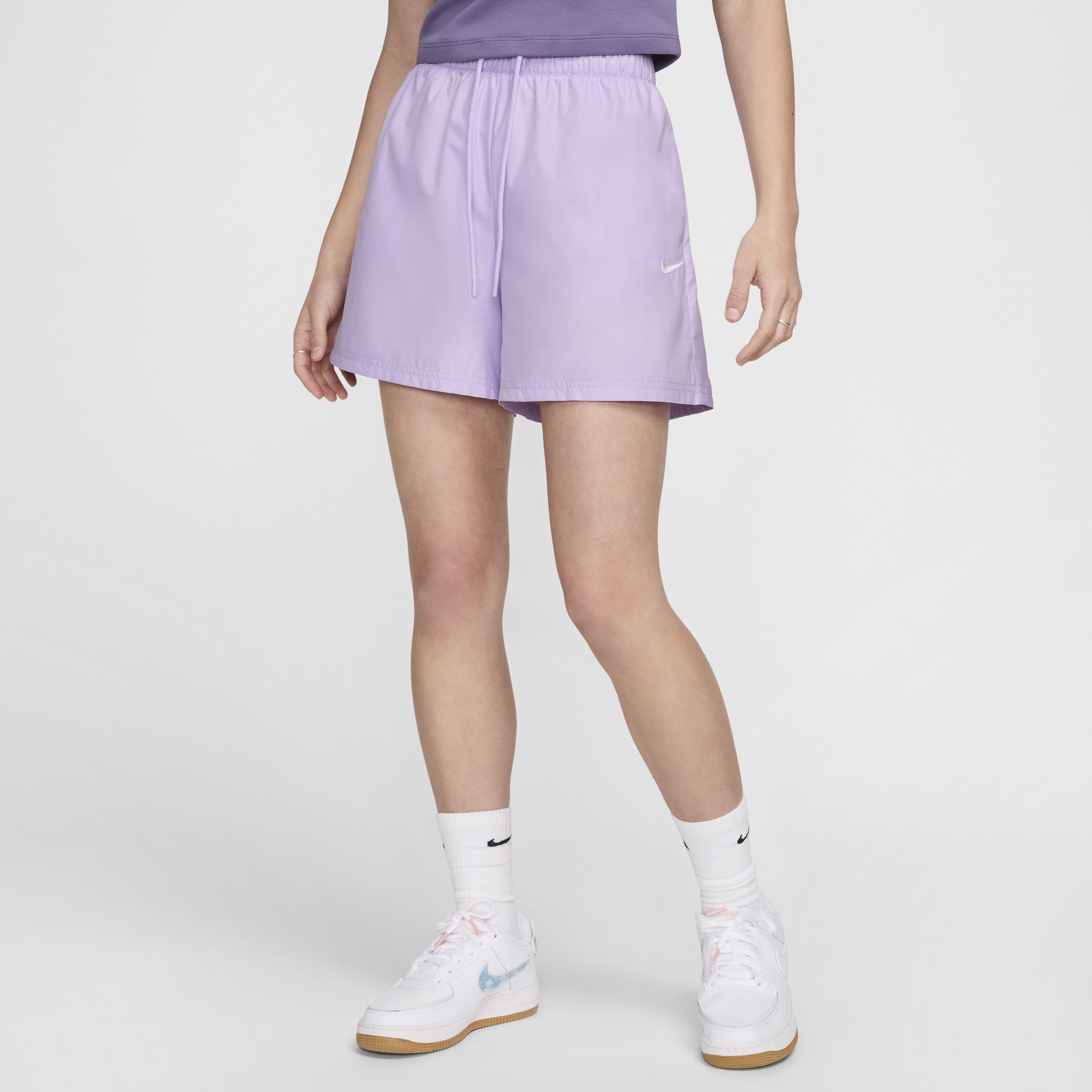Shop Nike Women's  Sportswear Essentials Repel Mid-rise Shorts In Purple
