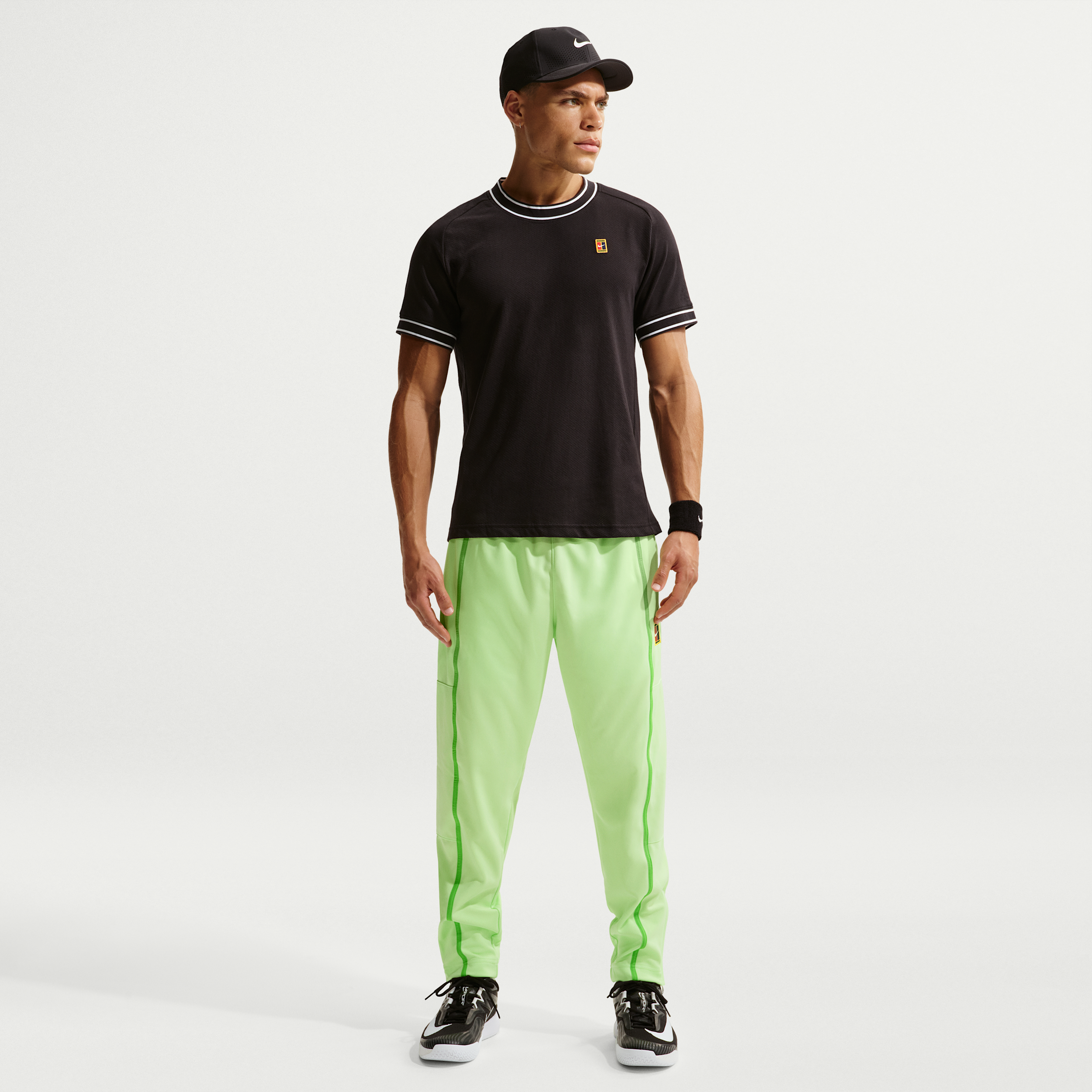 Nike Men's Court Heritage Tennis Pants in Green | FZ6928-360