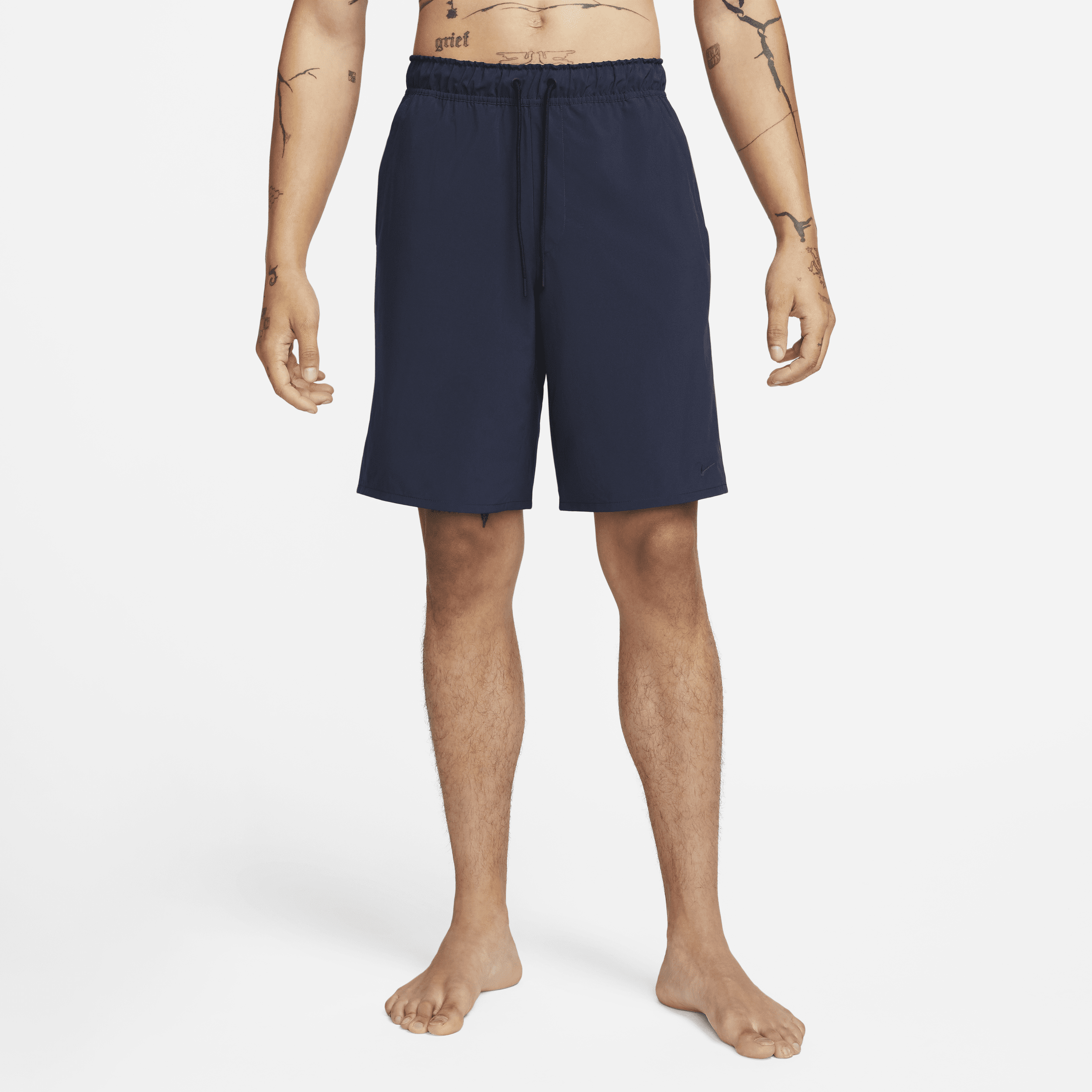 Shop Nike Men's Unlimited Dri-fit 9" Unlined Versatile Shorts In Blue