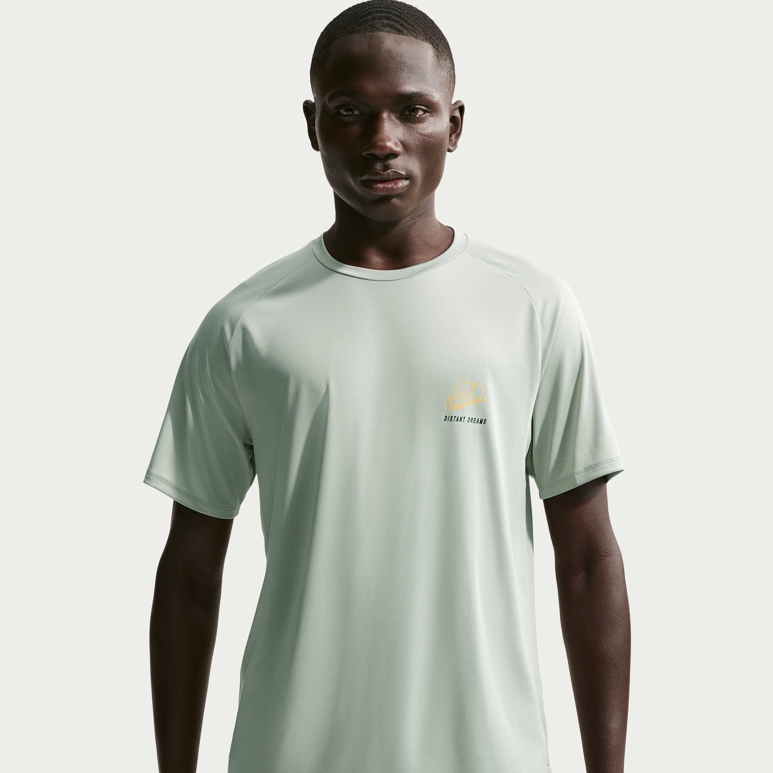 Nike Men's Stride Dri-FIT Distant Dreams ADV Running Top in Jade Horizon Size: Medium