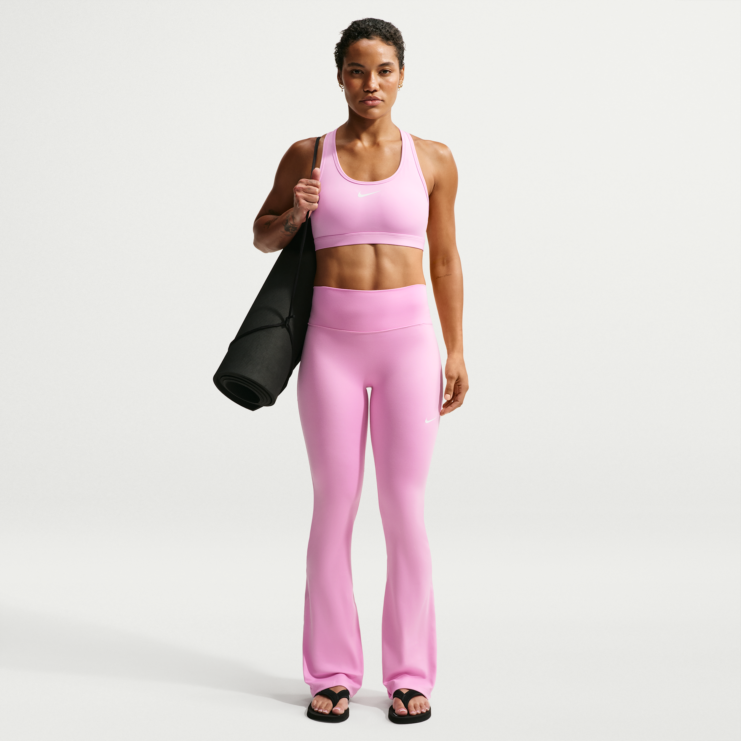 Nike Women's One High-Waisted Flared Leggings in Pink Rise/White Size: Small