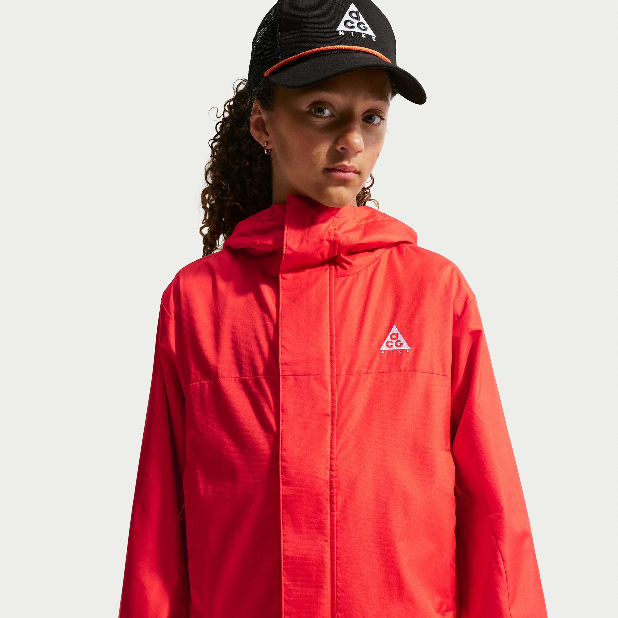 Nike ACG Essentials Big Kids' Rain Jacket in Red | 9WCA64-R35