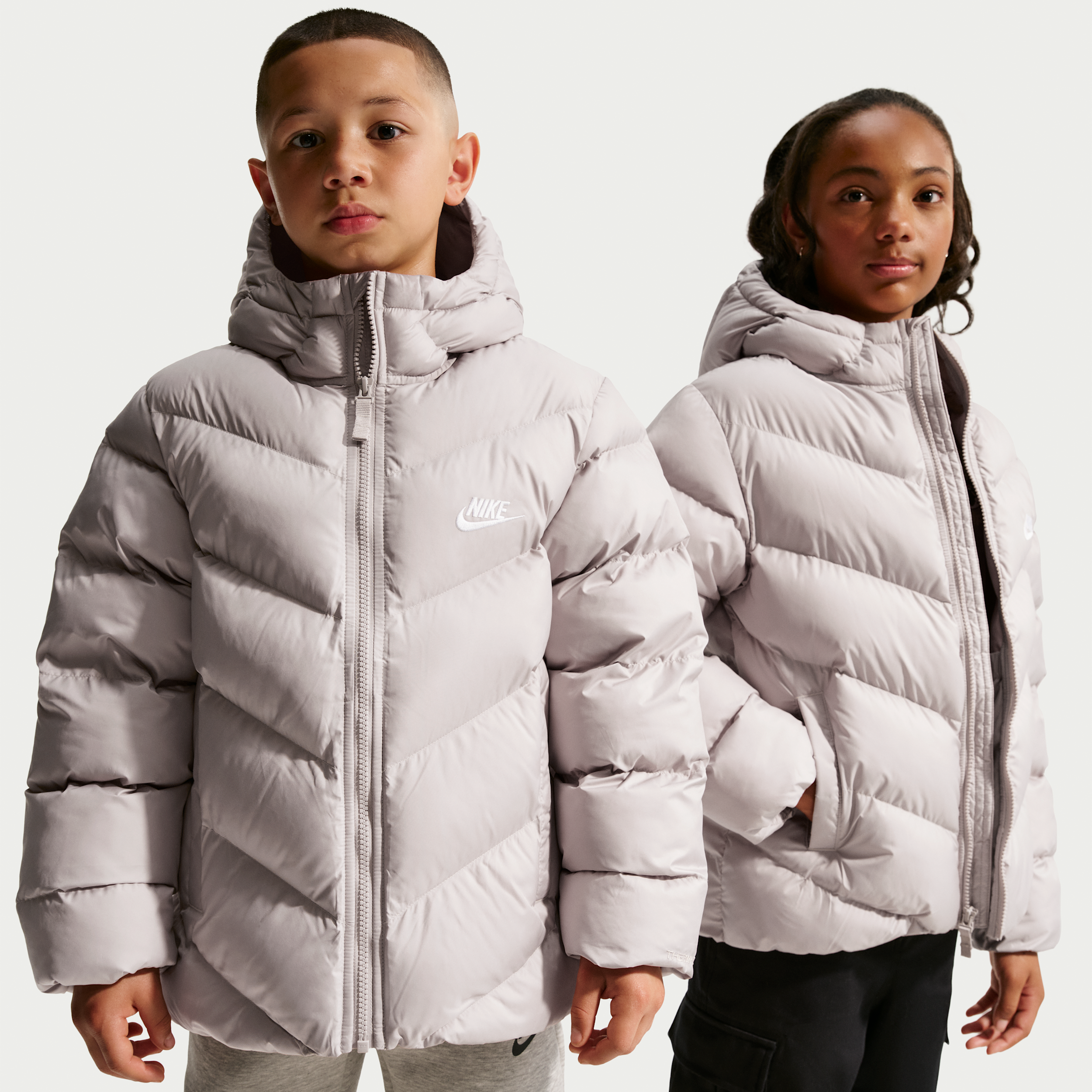 Nike Sportswear All Day Play Big Kids' Therma-FIT Loose-Fit Puffer Jacket in Brown | HQ4976-211