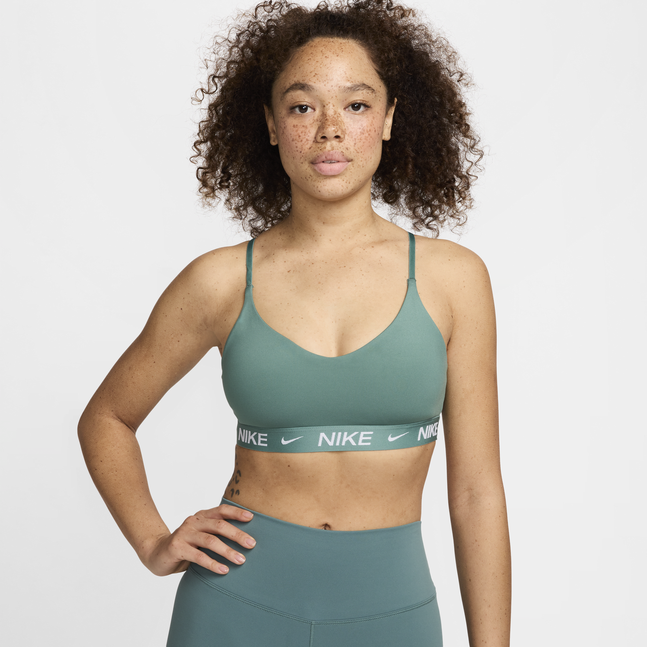 Shop Nike Women's Indy Light Support Padded Adjustable Sports Bra In Green