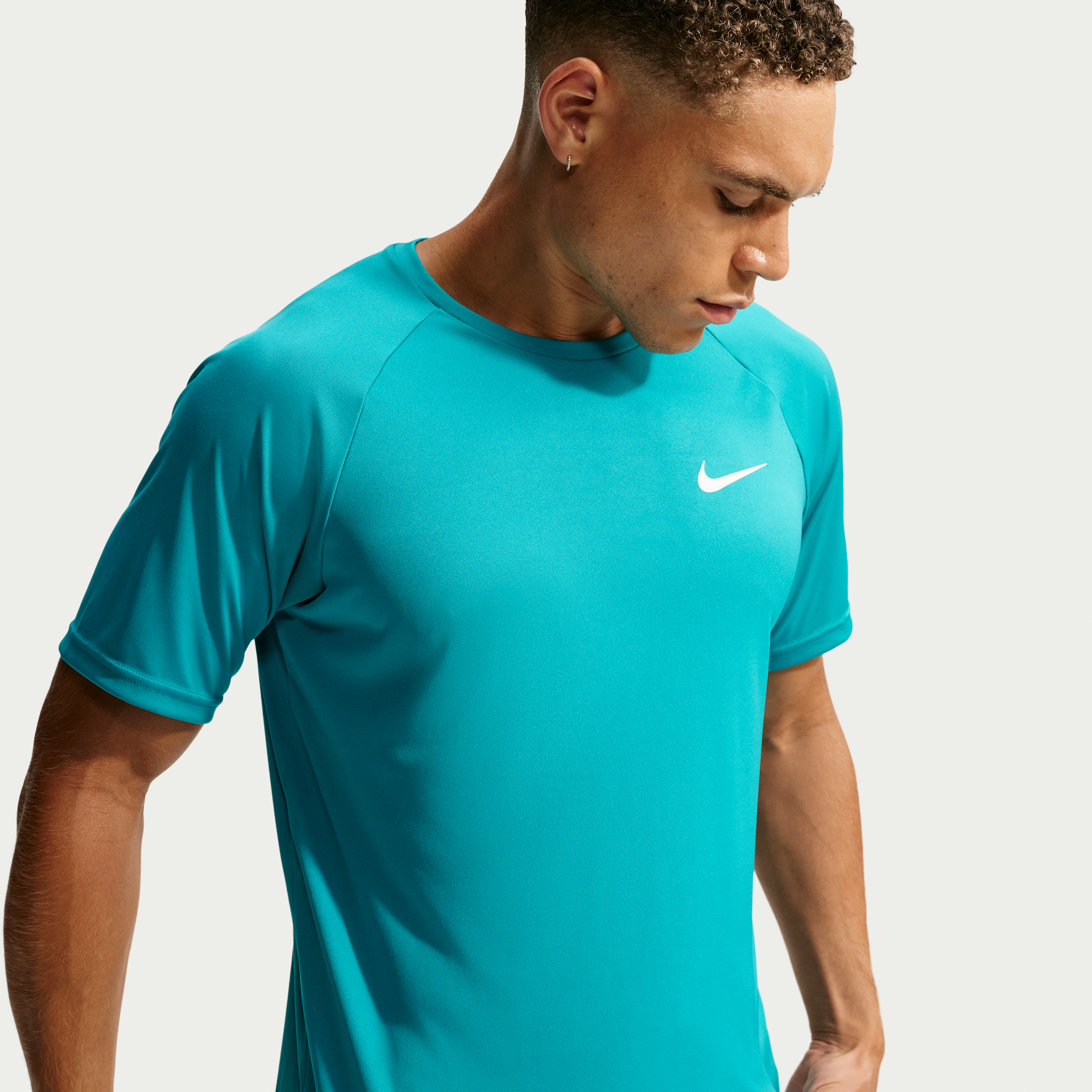 Nike Men's Swim Hydroguard Essential Dri-FIT UV Short Sleeve Top in Green | NESSA586-385