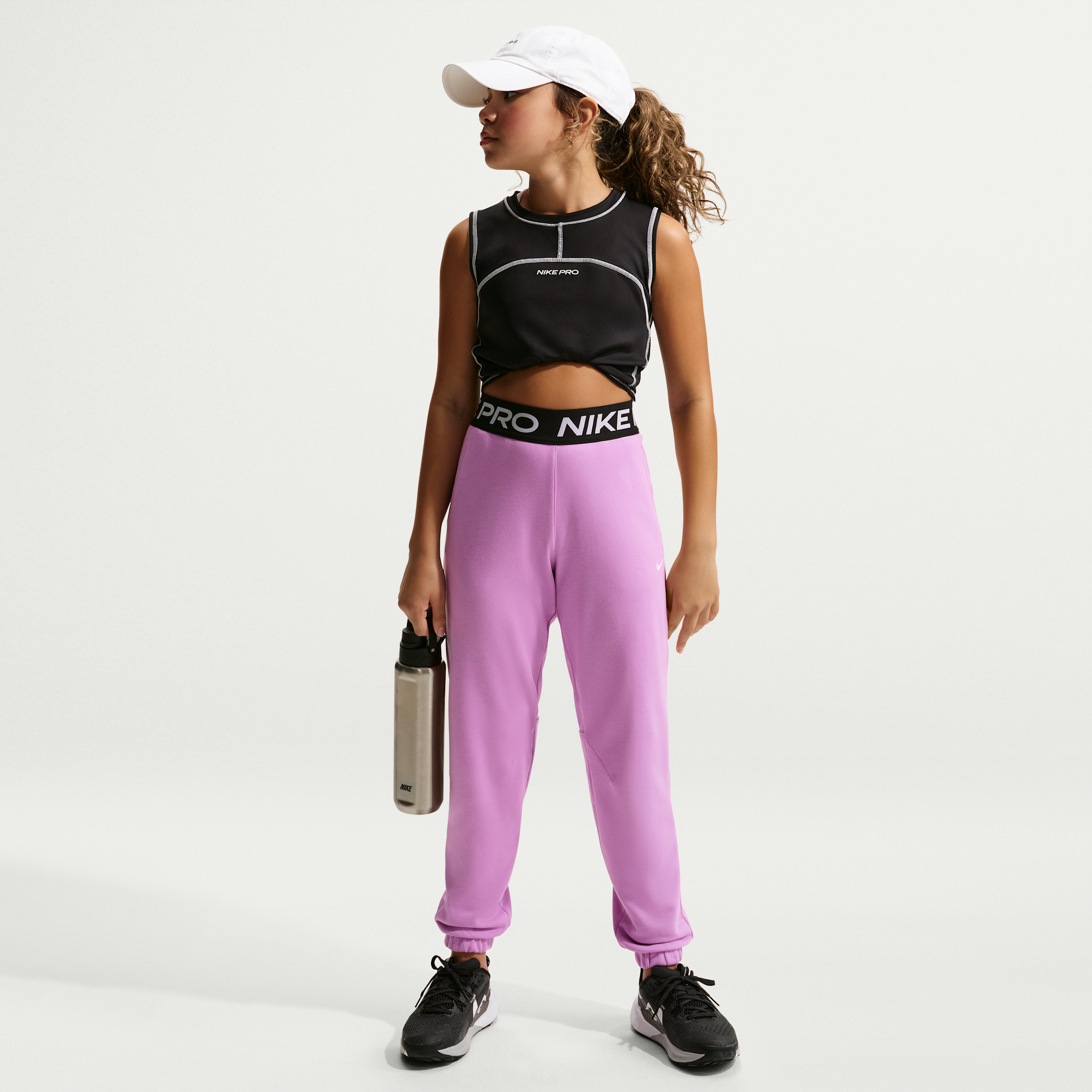 Nike Pro Fleece Big Kids' (Girls') Dri-FIT Jogger Pants in Purple | HV0289-503
