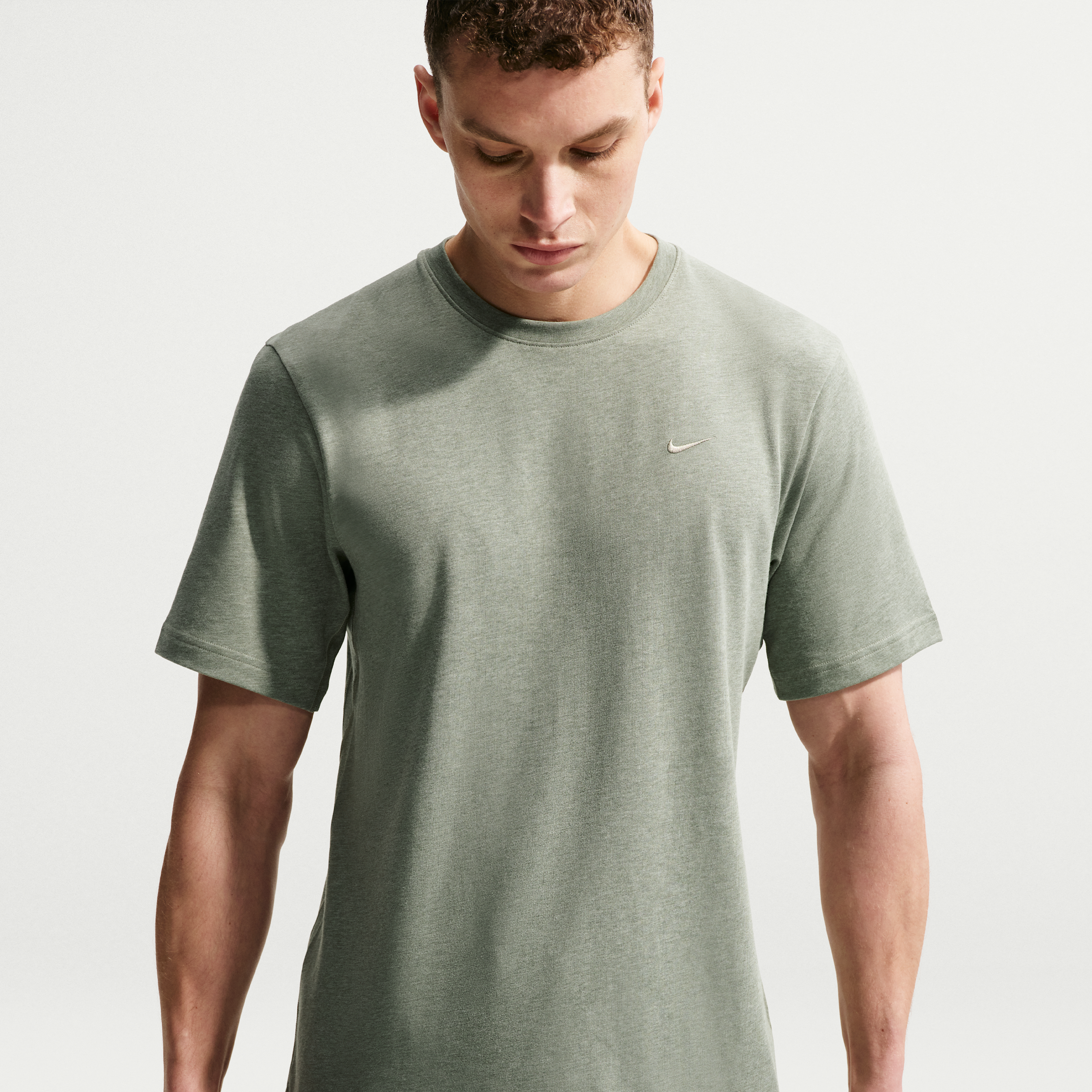 Nike Men's Primary Dri-FIT Short-Sleeve Versatile Top in Green | DV9831-320