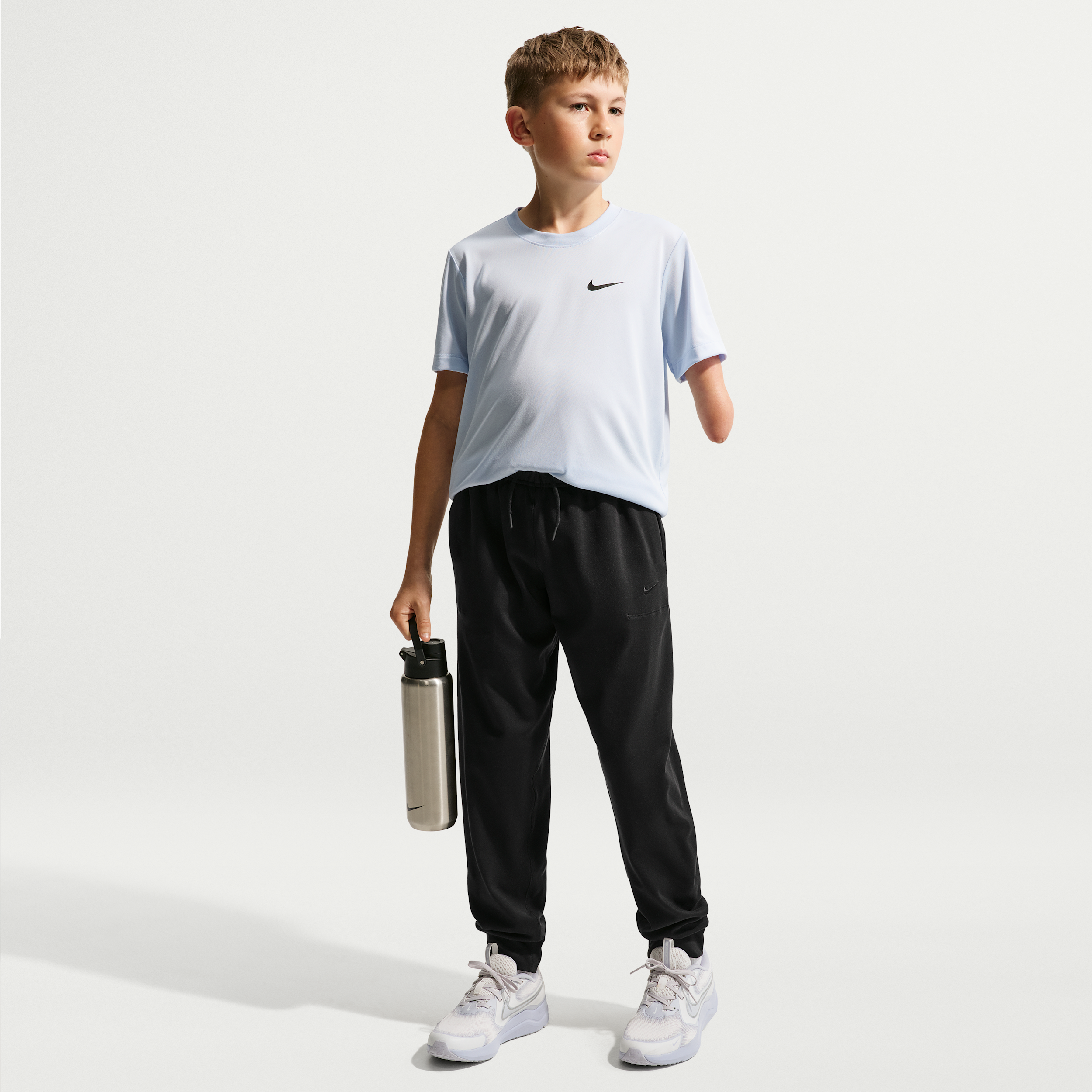 Nike Primary Nano Big Kids' (Boys') Dri-FIT UV Nano Jogger Pants in Black | IU3118-010