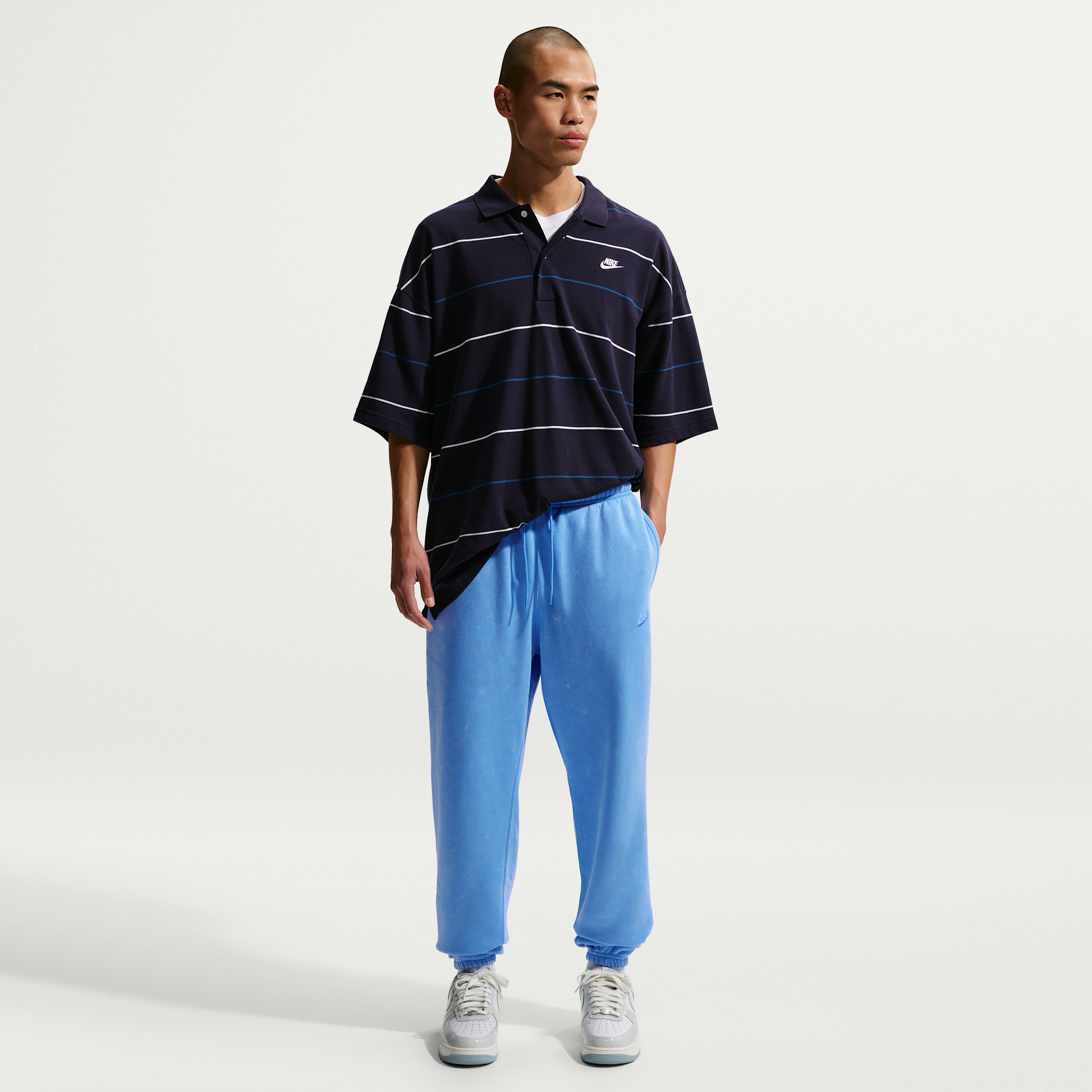 Men's Nike Sportswear Club Washed Cuffed Fleece Pants in Blue | IQ1218-412
