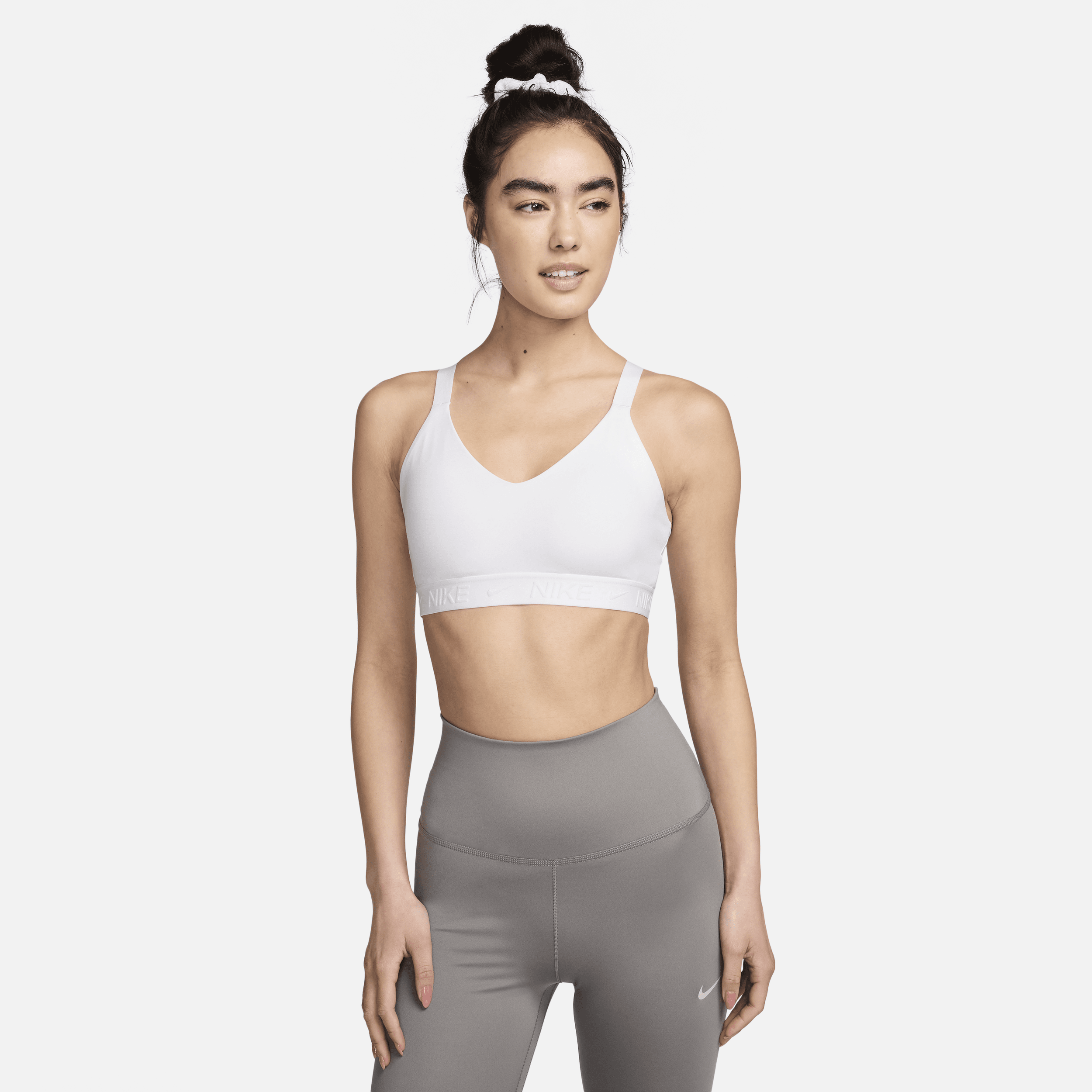 Shop Nike Women's Indy Medium Support Padded Adjustable Sports Bra In White