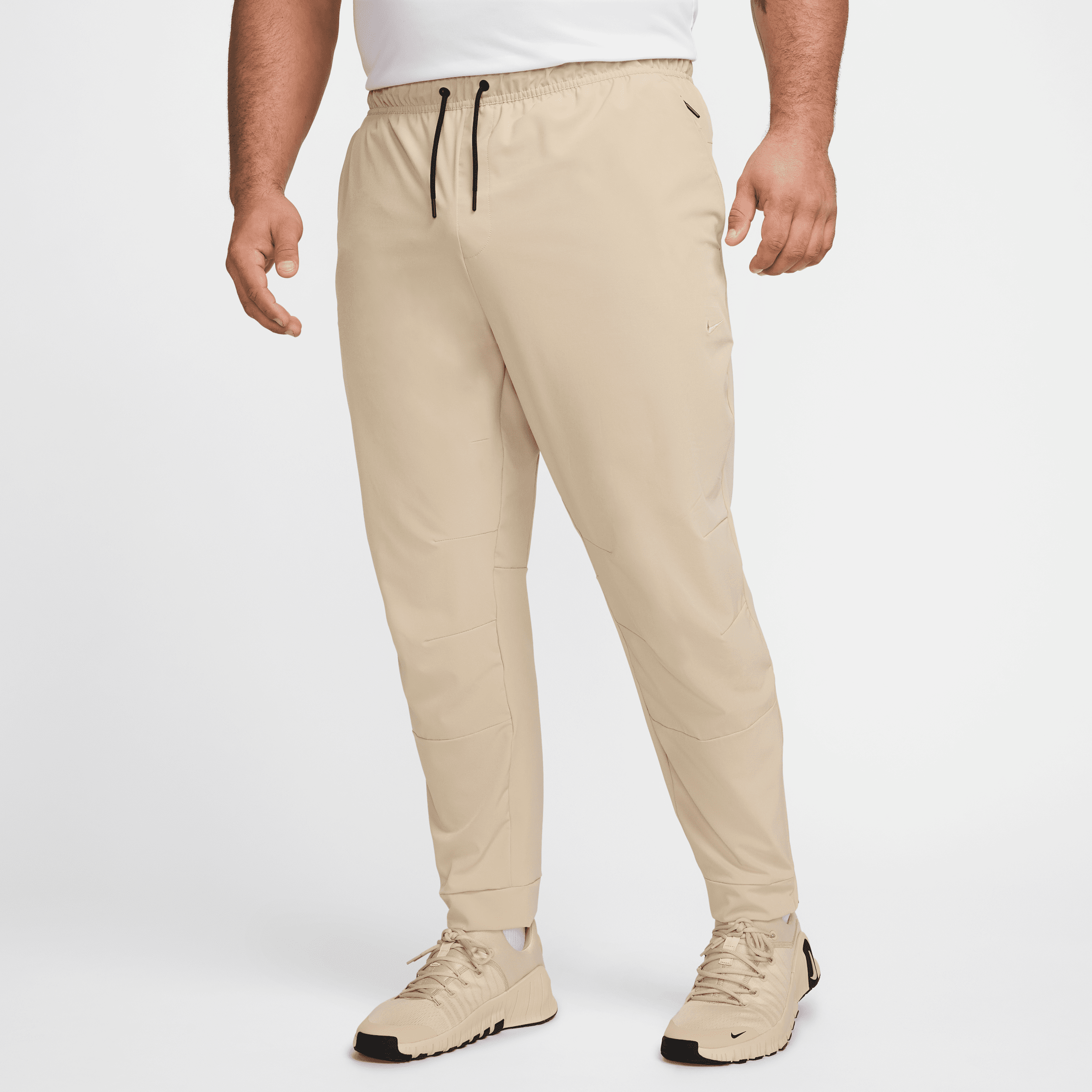 Nike Men's Unlimited Dri-fit Zippered Cuff Versatile Pants In Brown