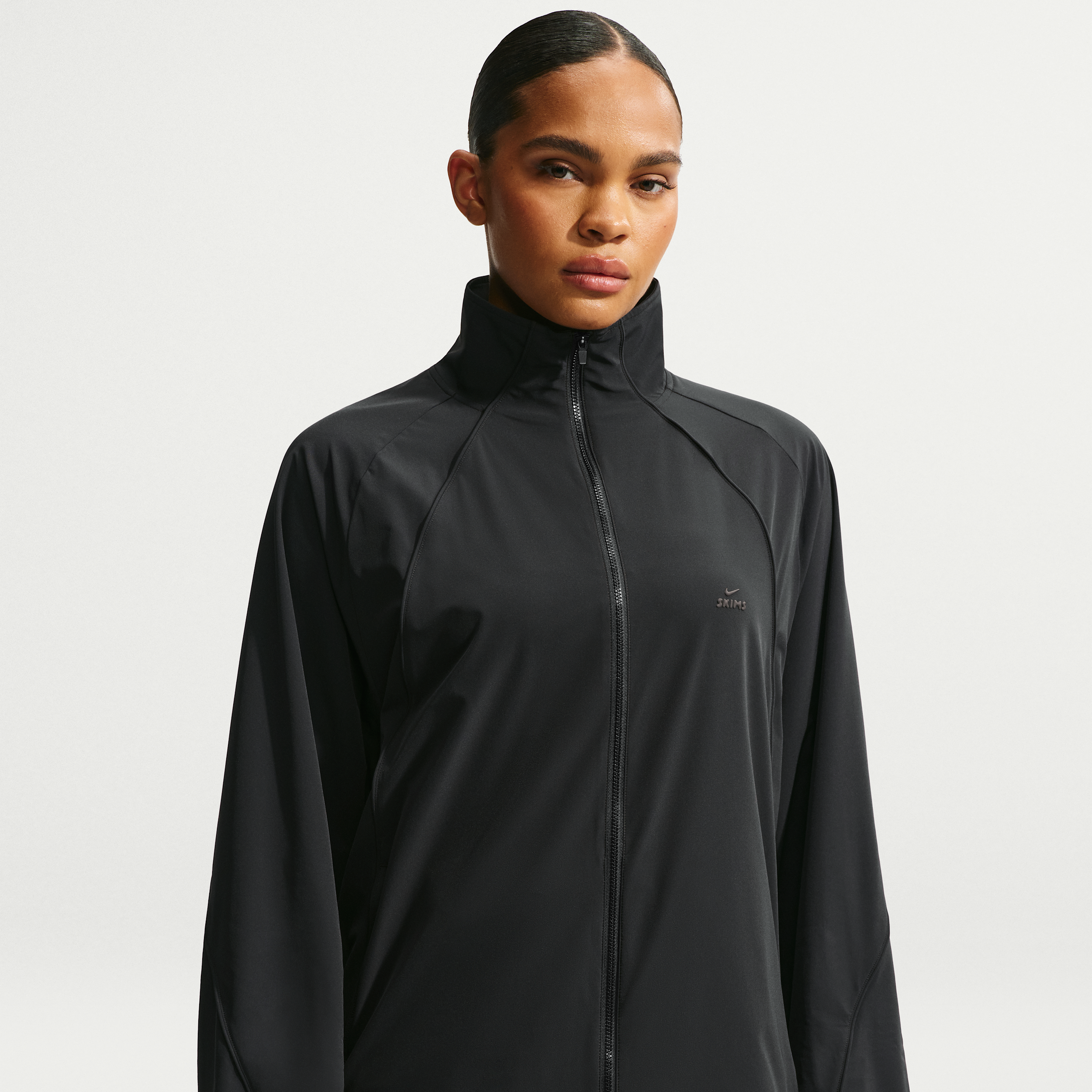 Nike Women's SKIMS Stretch Nylon Oversized Jacket in Black | IU2223-054