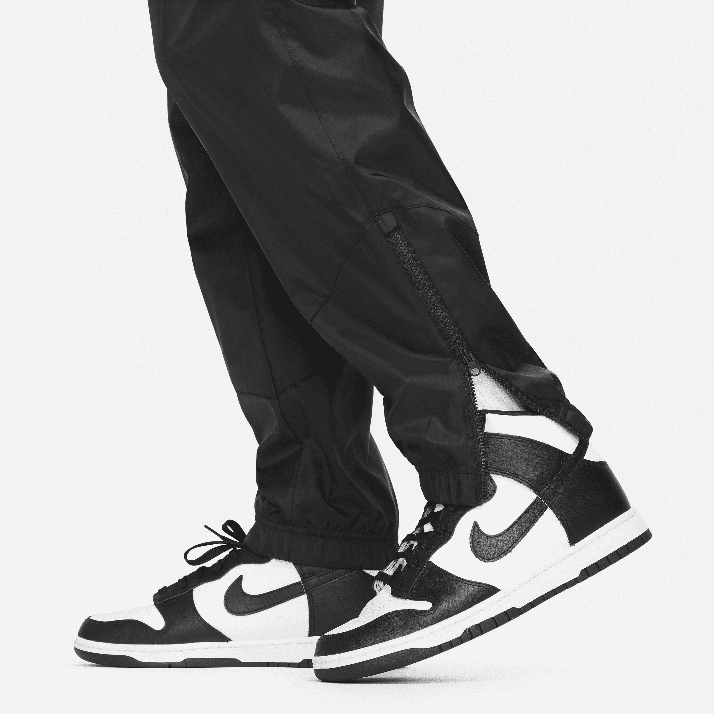 Pantalon doublé en tissu tissé Nike Windrunner pour homme - Noir
