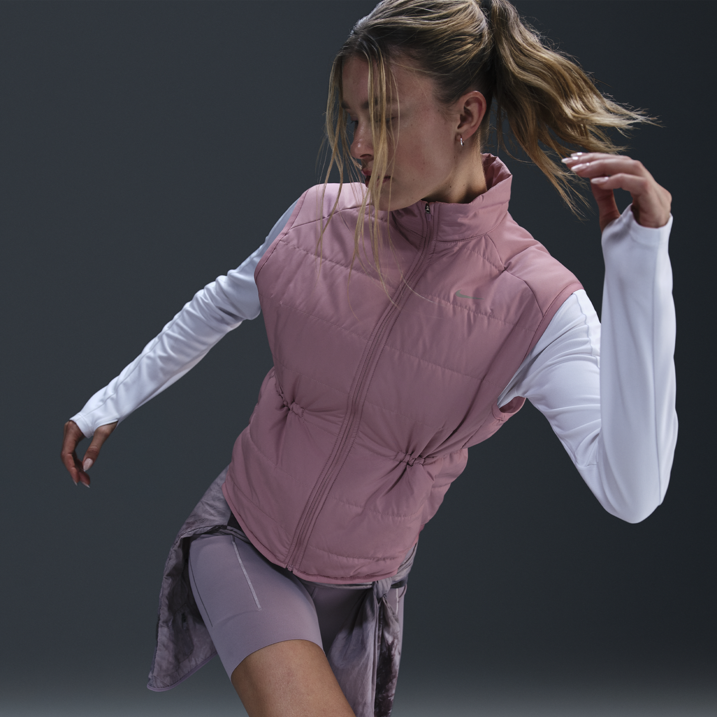 Nike Therma-FIT Swift Hardloopbodywarmer voor dames Paars