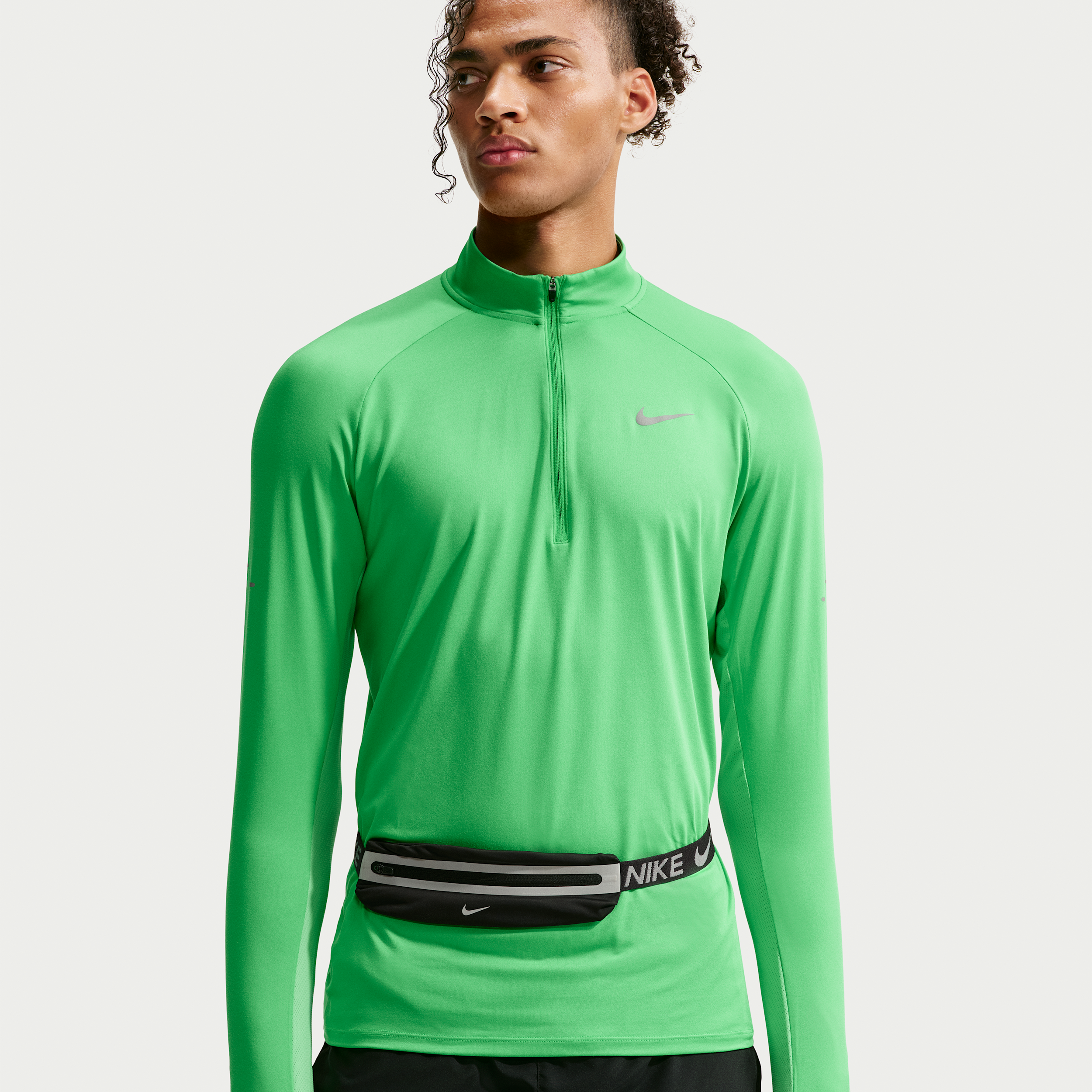 Nike Stride Dri-FIT-løbetop med 1/2 lynlås til mænd - grøn