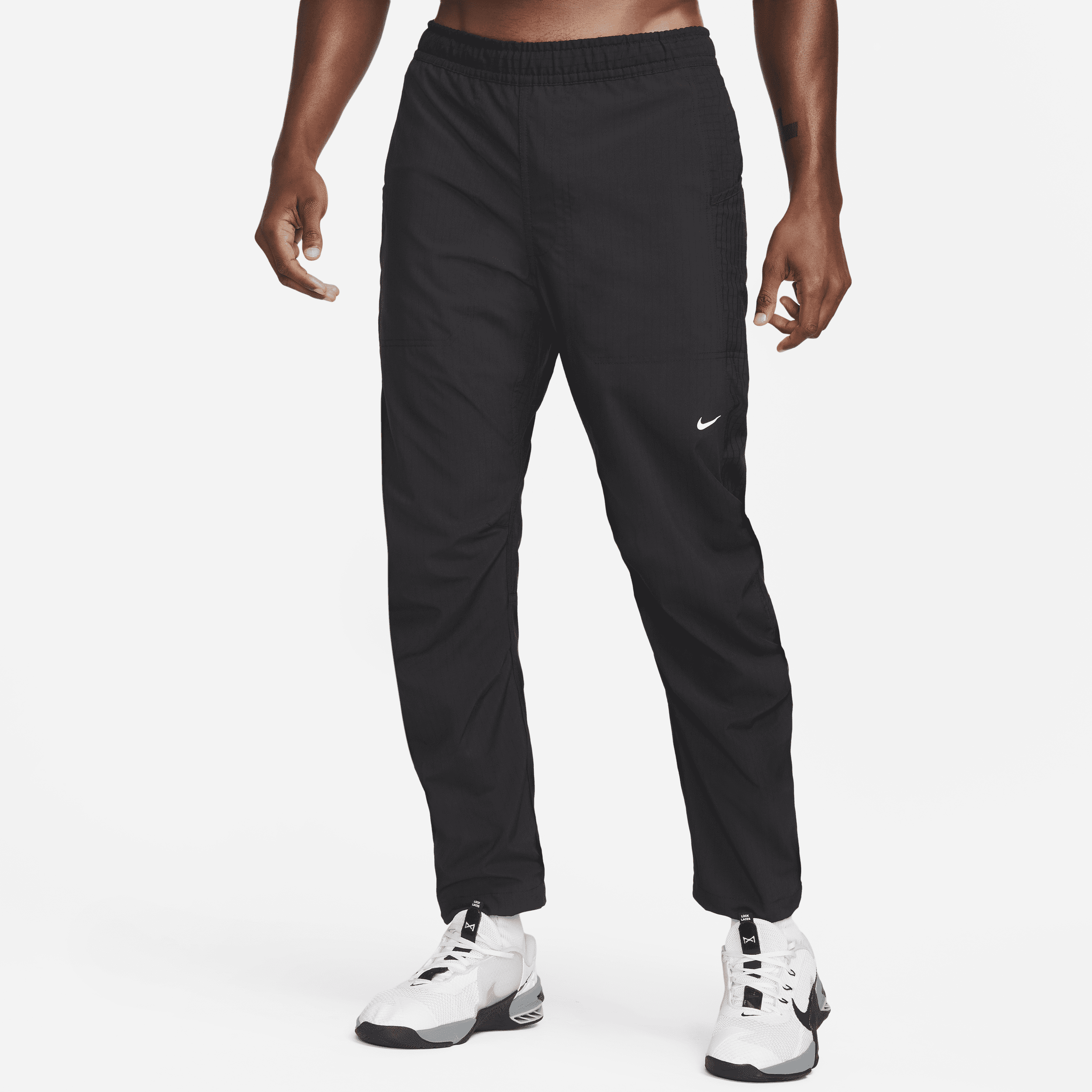 Męskie spodnie z tkaniny do fitnessu Nike Dri-FIT ADV A.P.S. - Czerń