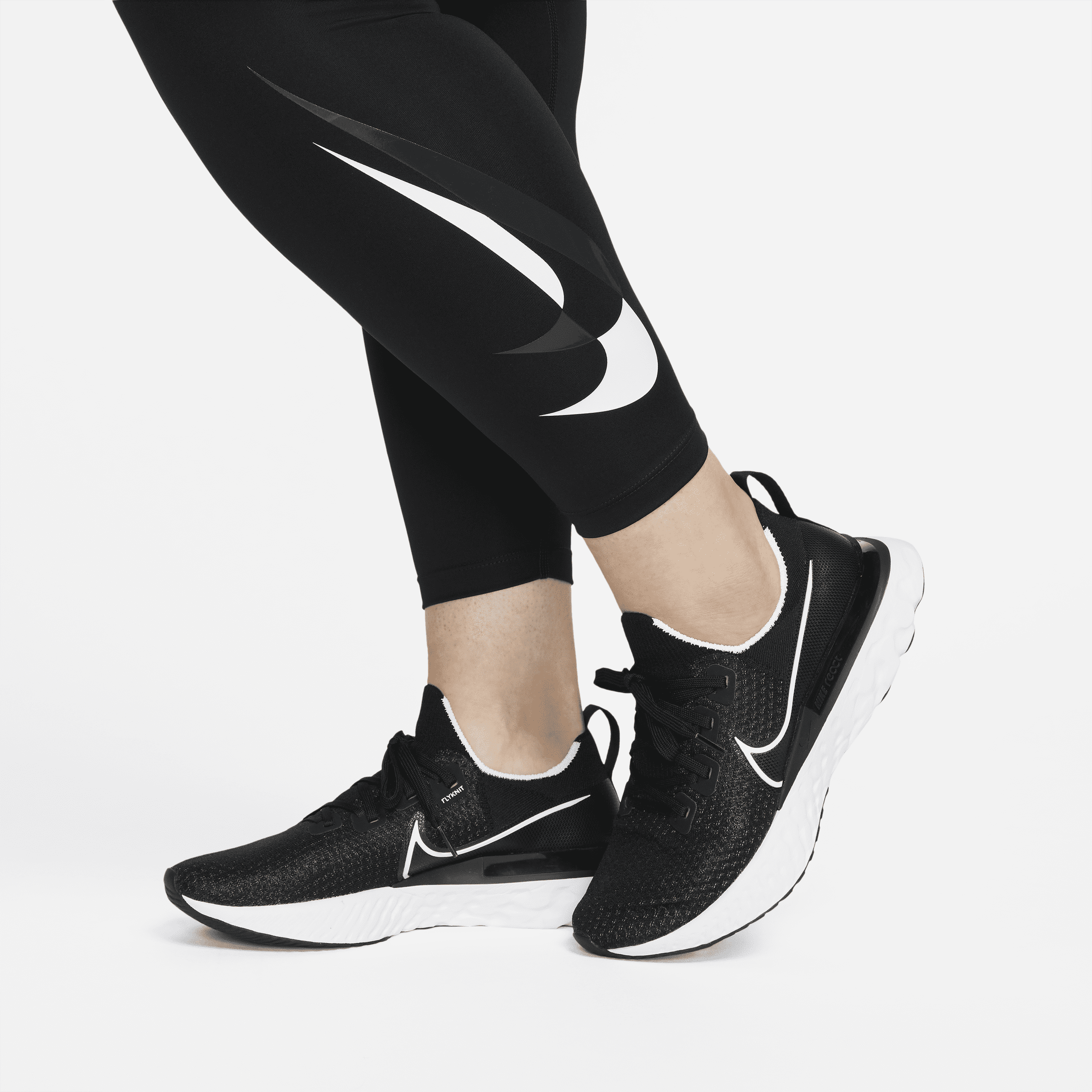 Nike Running swoosh leggings in black