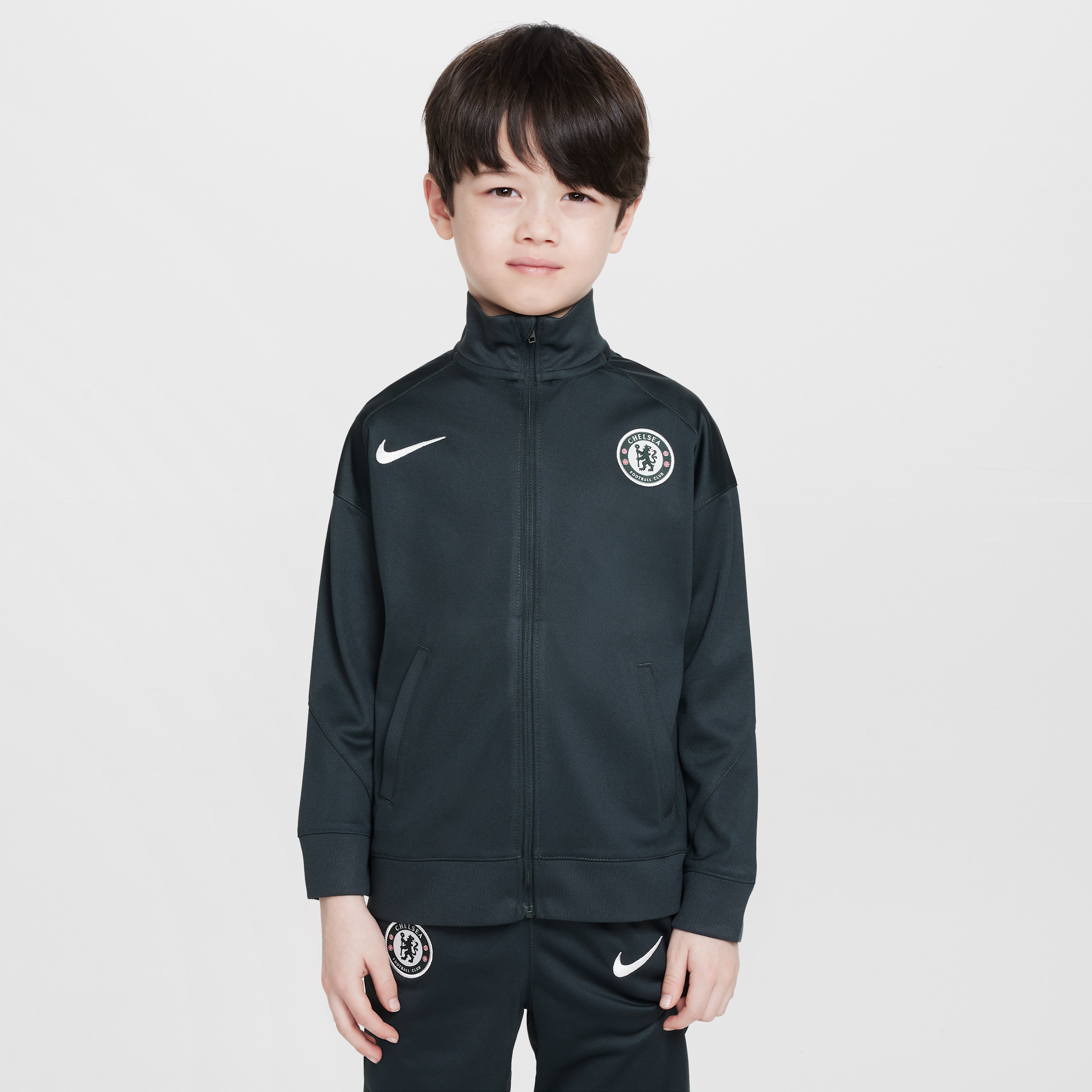 Thumbnail - FC Chelsea Strike Nike Dri-FIT Fußball-Tracksuit aus Strickmaterial (jüngere Kinder) - Grün