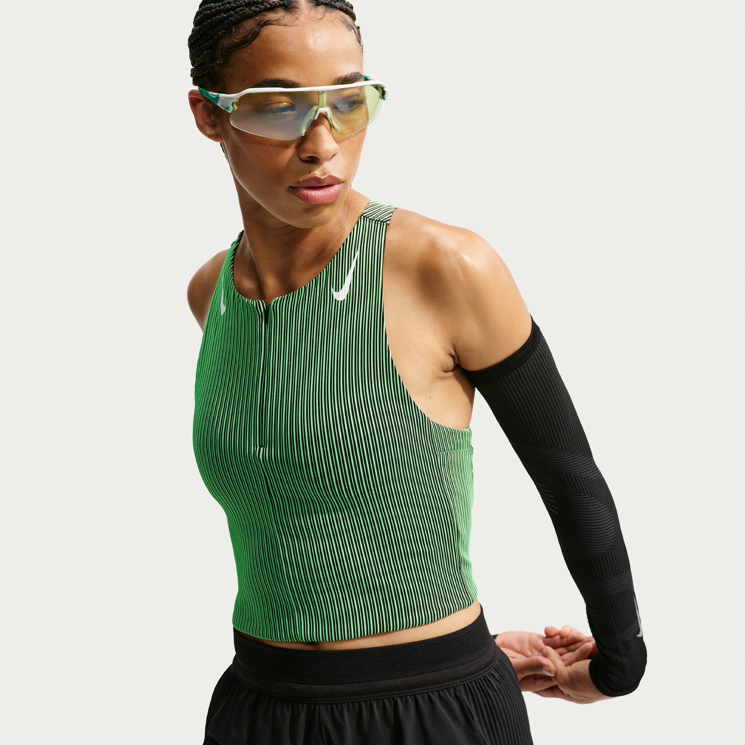 Kort Nike AeroSwift Dri-FIT ADV-løbetanktop med lommer til kvinder - grøn