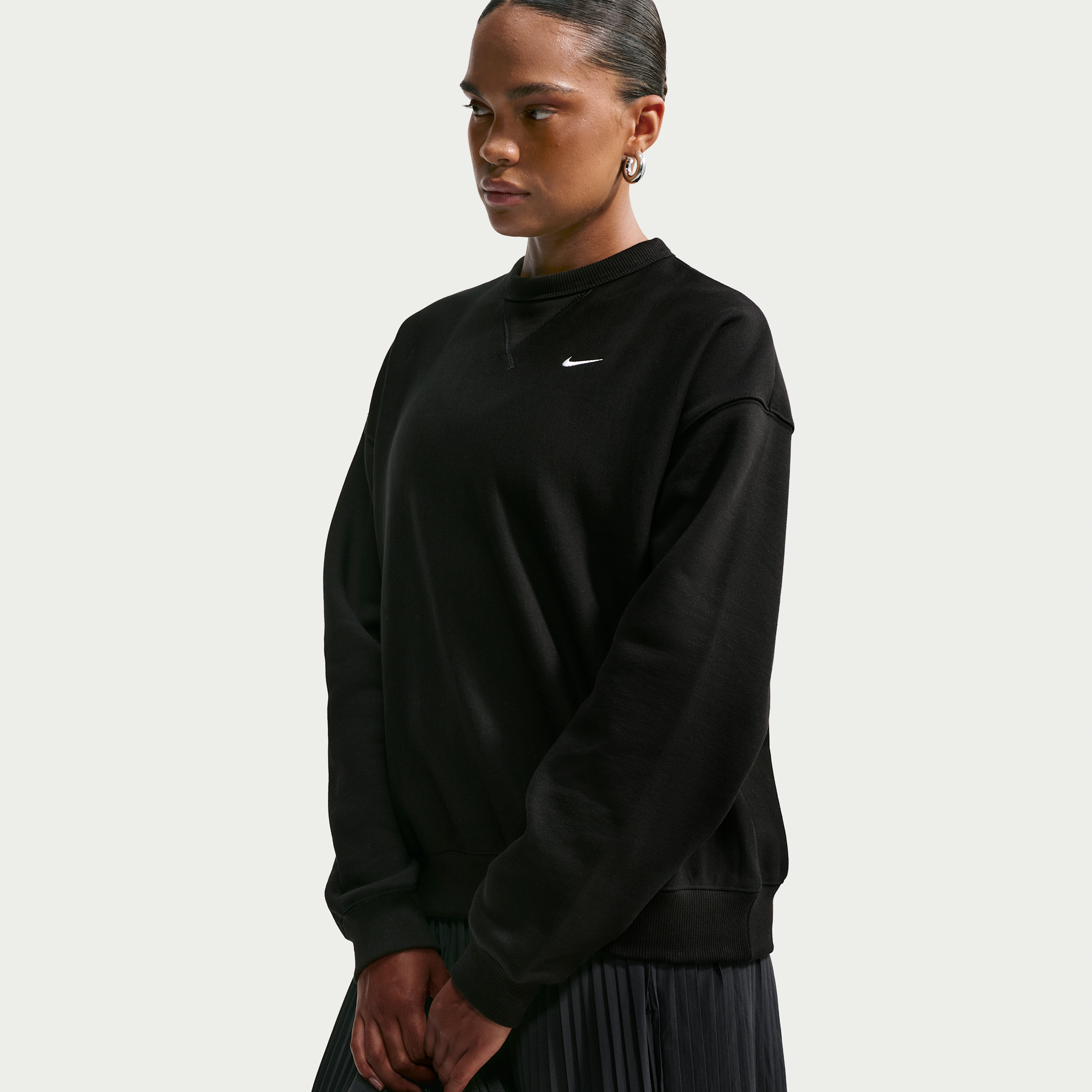 Oversized Nike Studio Fleece-crewtrøje i kraftigt materiale til kvinder - sort