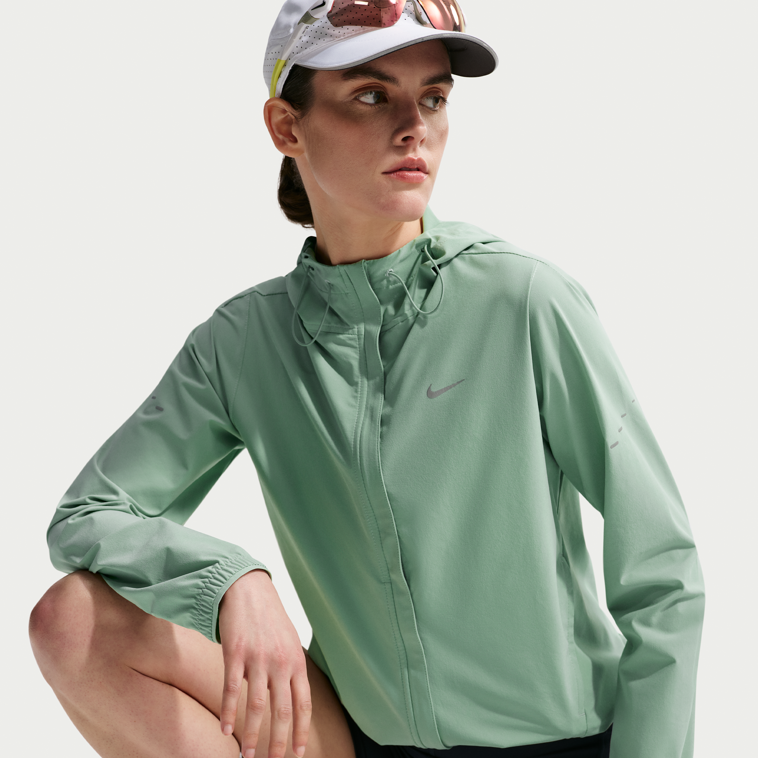 Sammenfoldelig Nike Swift Repel-løbejakke til kvinder - grøn