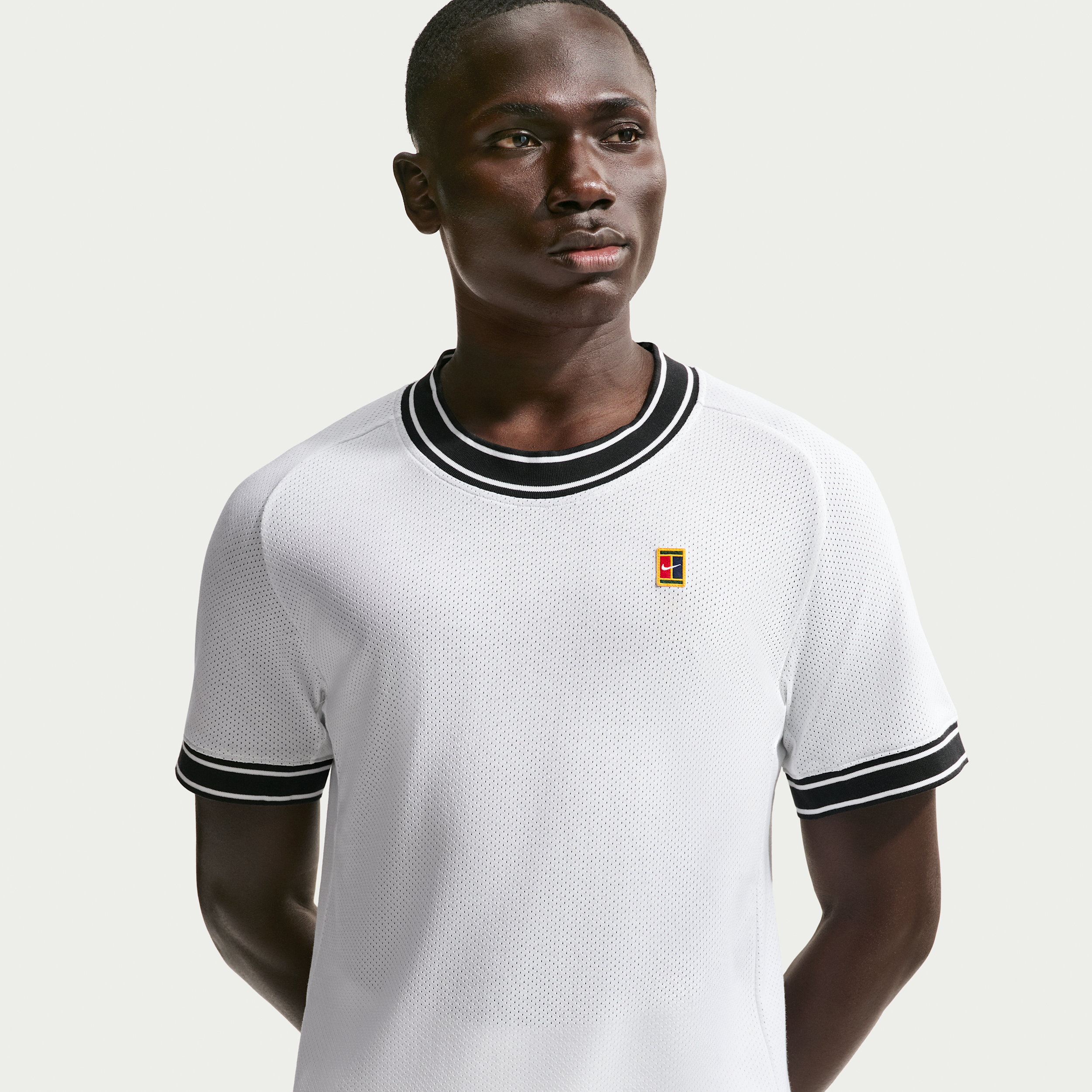 NikeCourt Heritage tennistrøje med korte ærmer til mænd – hvid